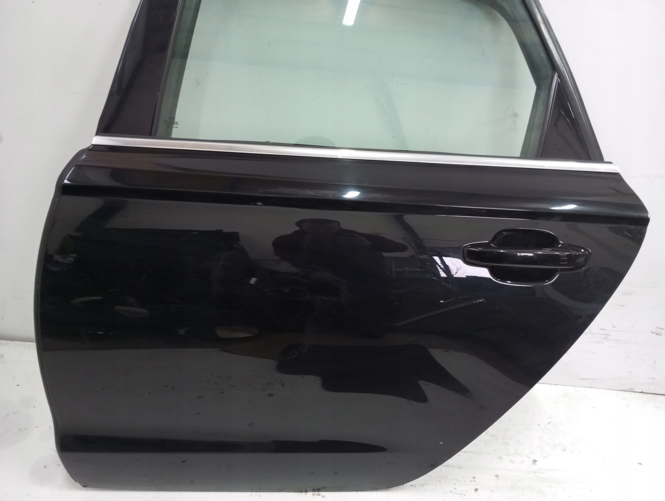 door Audi A6 4G0 sedan left rear.
