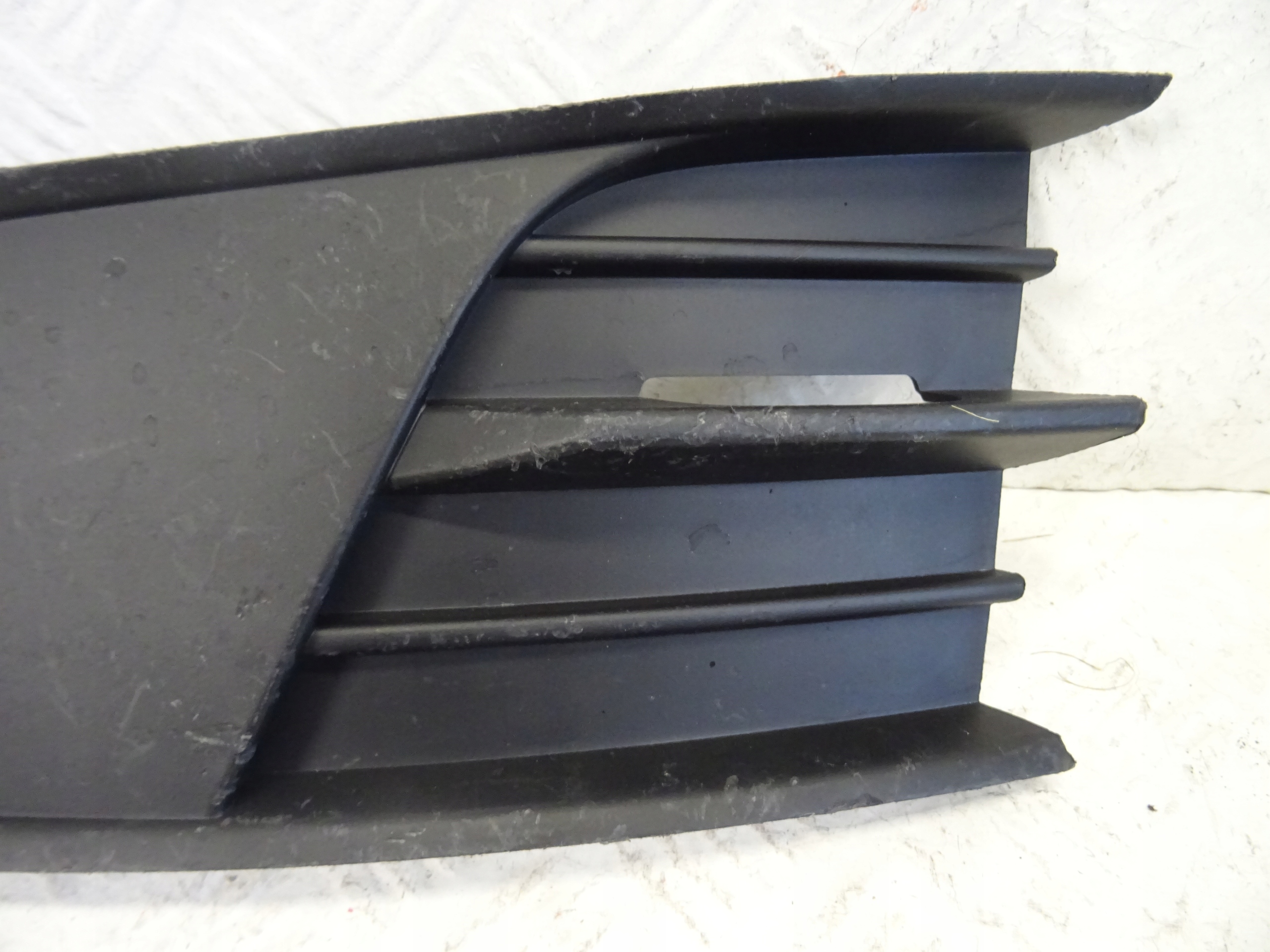 grid of a bumper front front left SKODA FABIA III 3 6V0807367