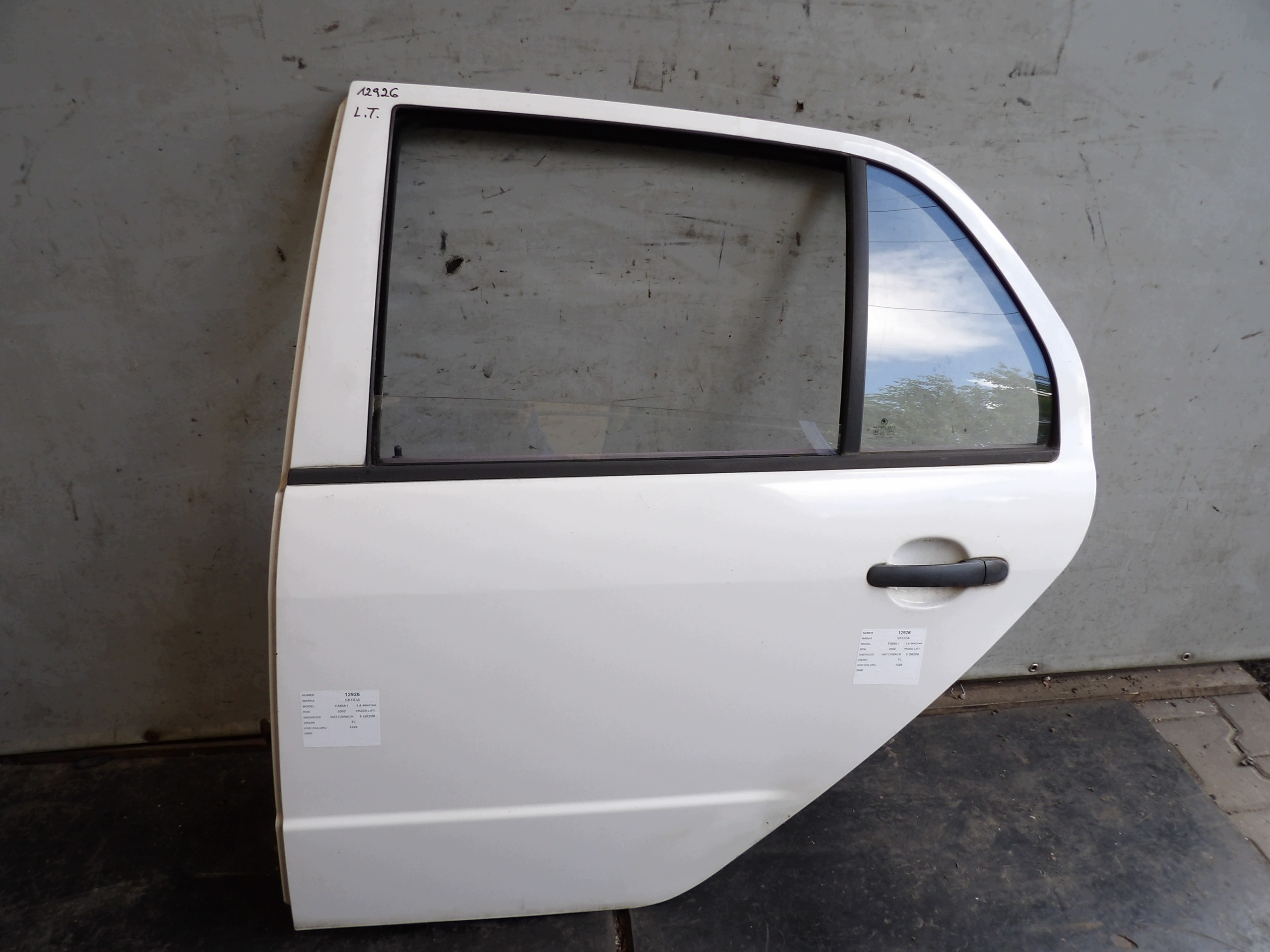 Skoda Fabia and door rear. left 1026 HB