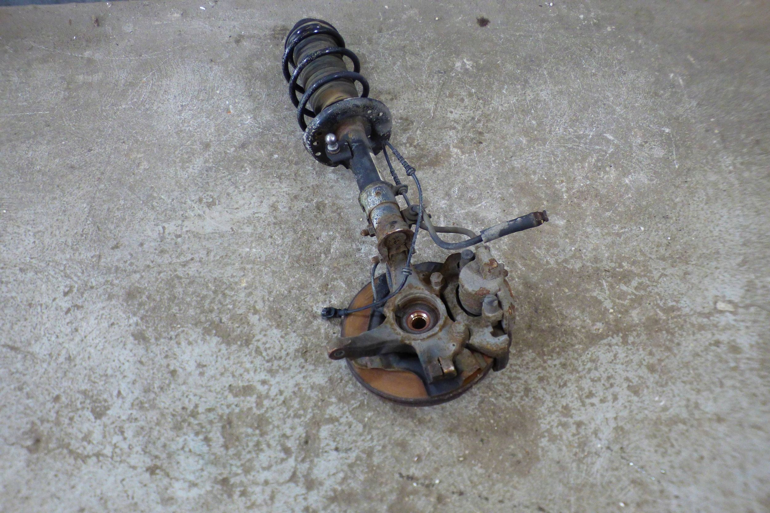 Opel Corsa E 1.4 1.2 B McPherson left 13434139 st.BDB