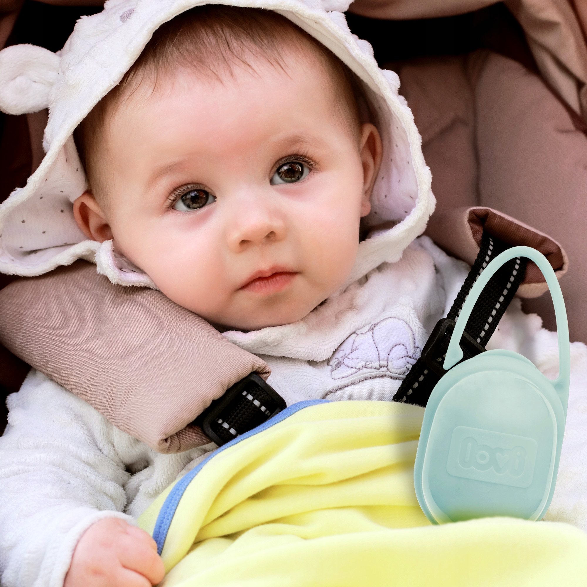 Etui na smoczek LOVI pojemnik uniwersalny z mocowaniem do wózka miętowy Materiał plastik