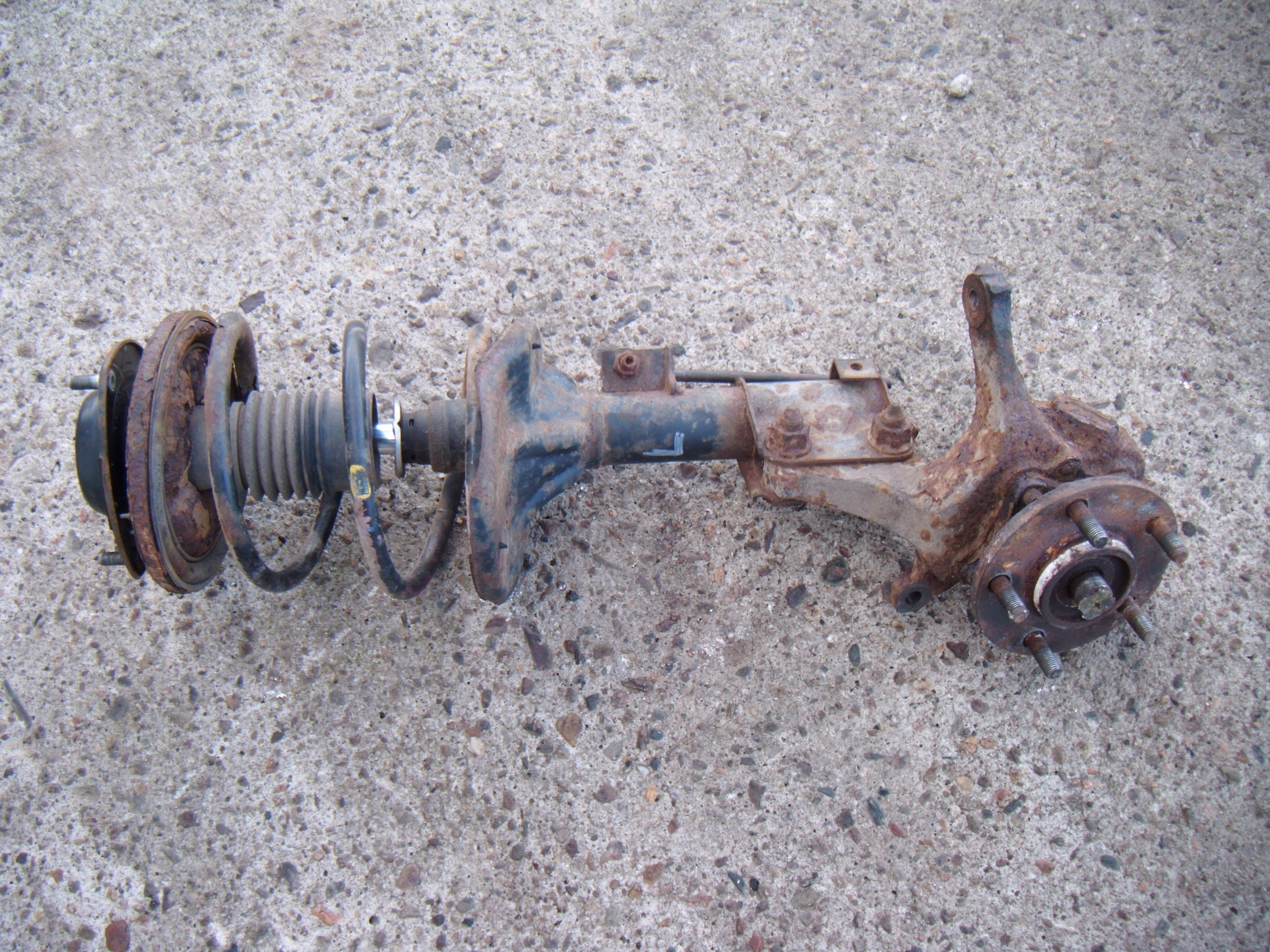 ECLIPSE 3G 00-05 2.4 ZWROTNICA PIASTA AMORTYZATOR LEWY PRZÓD