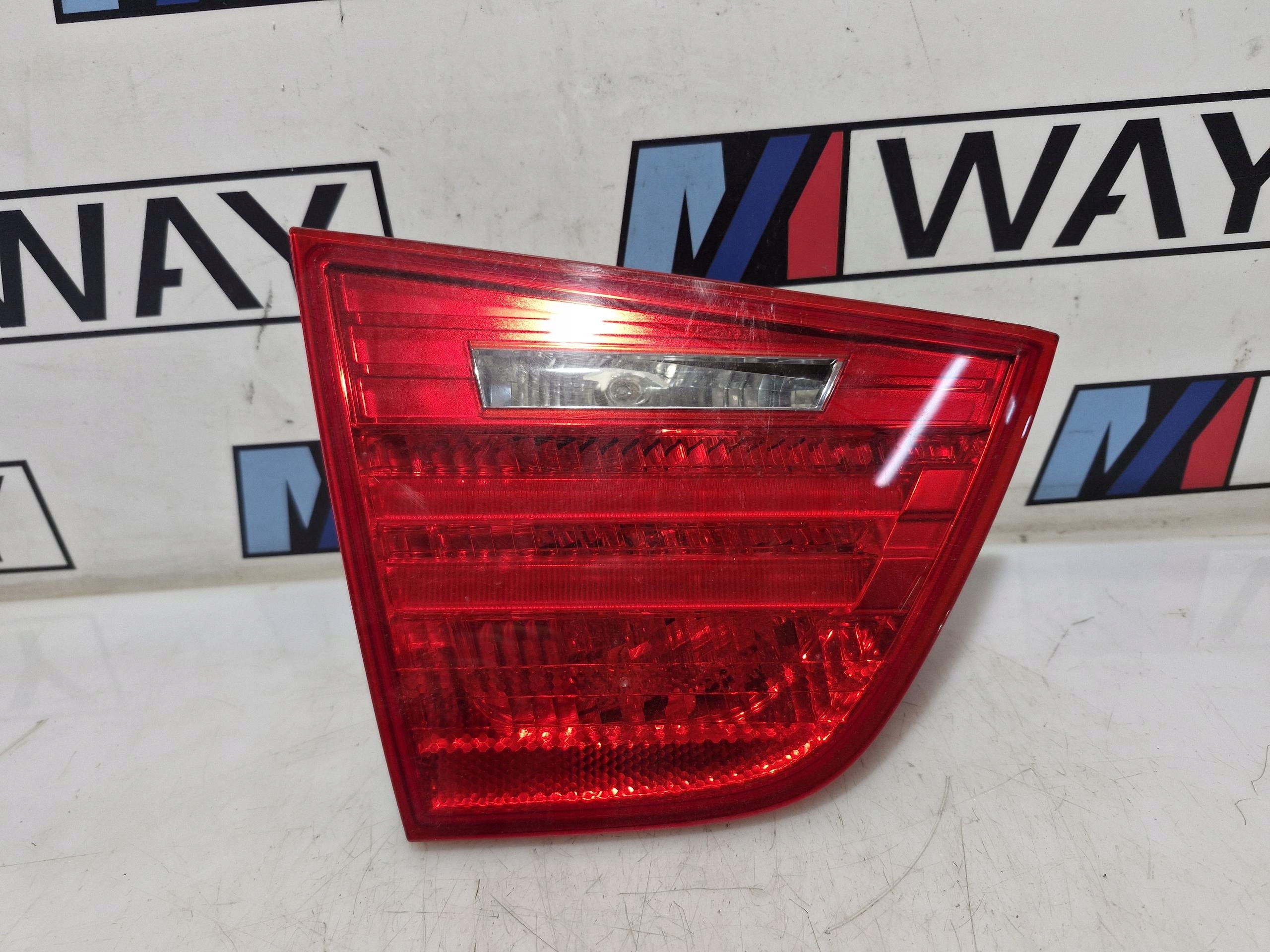 7289433 BMW E91 light left left rear part to the bonnet