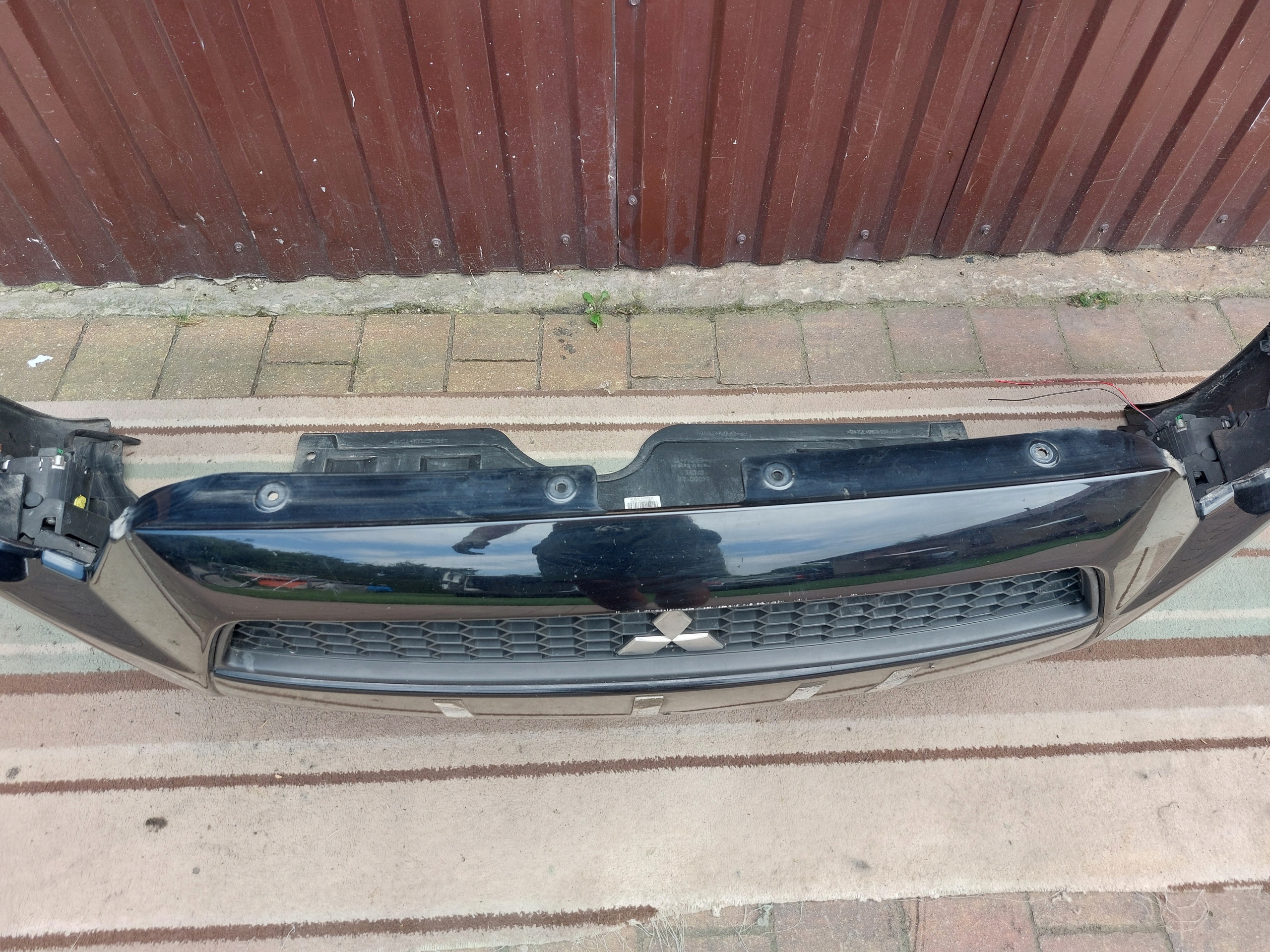 bumper front MITSUBISHI COLT 6 VI LIFT 08-12 6400C105 black