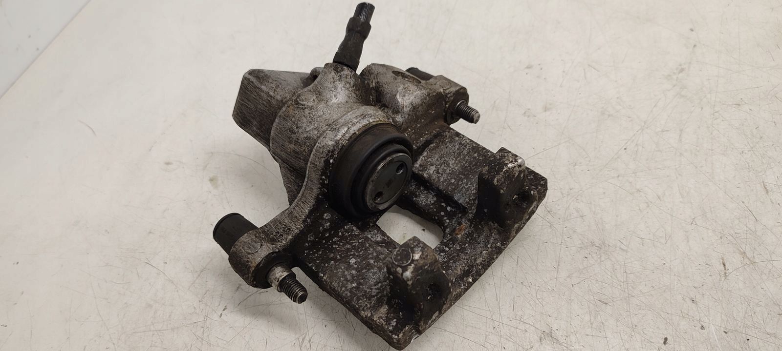 caliper rear part rear left Ford Focus MK3 1,6 TDCI