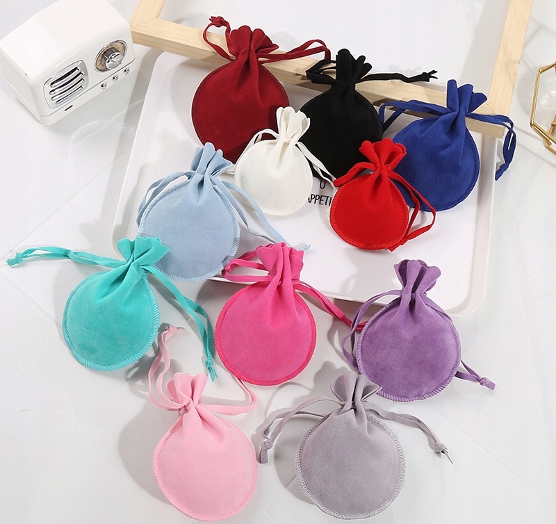 AKSAMITNY WORECZEK NA KOŚCI MONETY SAKIEWKA 9X12CM Materiał tkanina