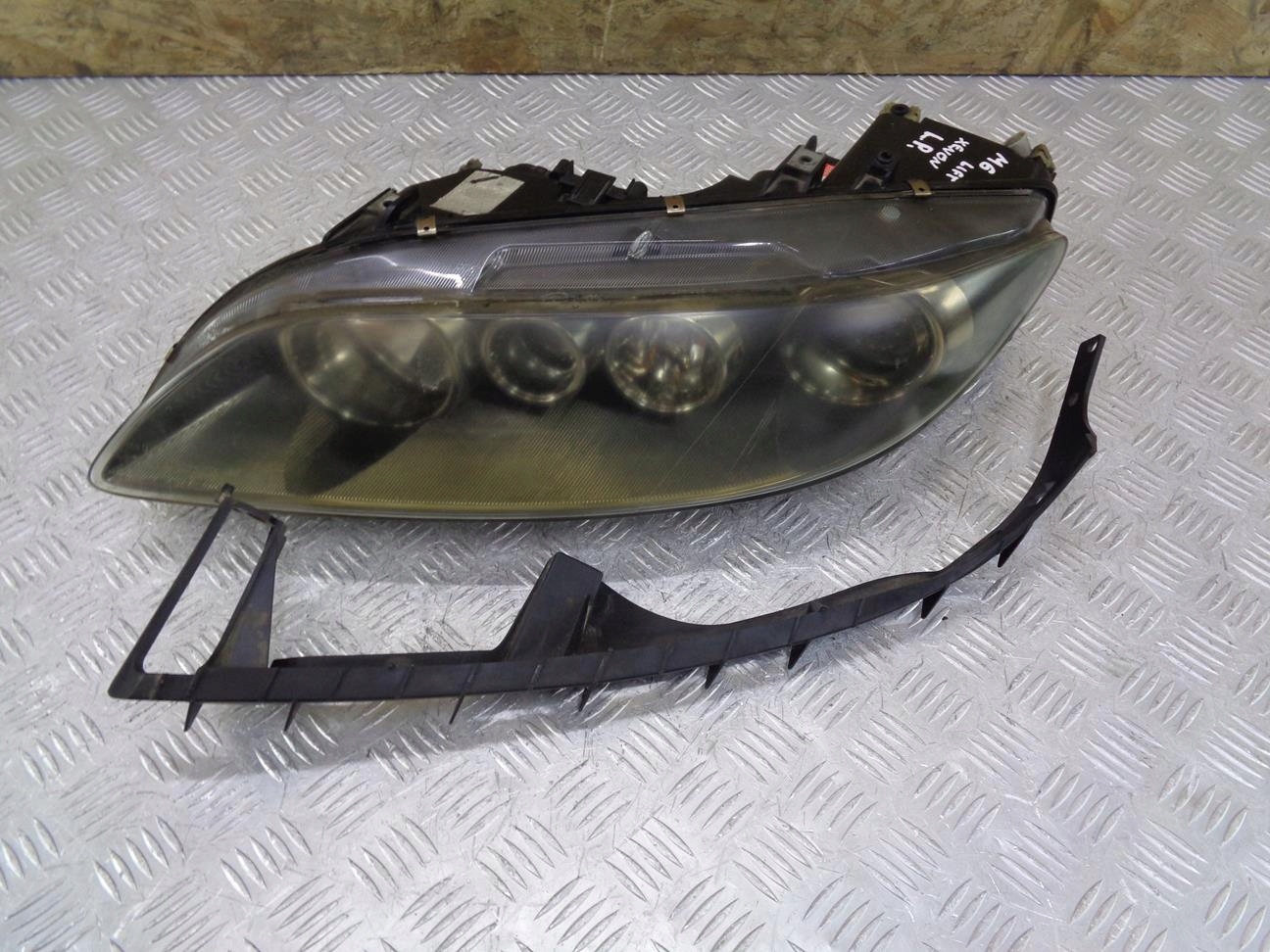 фара левая передняя ксенон mazda 6 и GG GY рестайлинг 05- F014003906