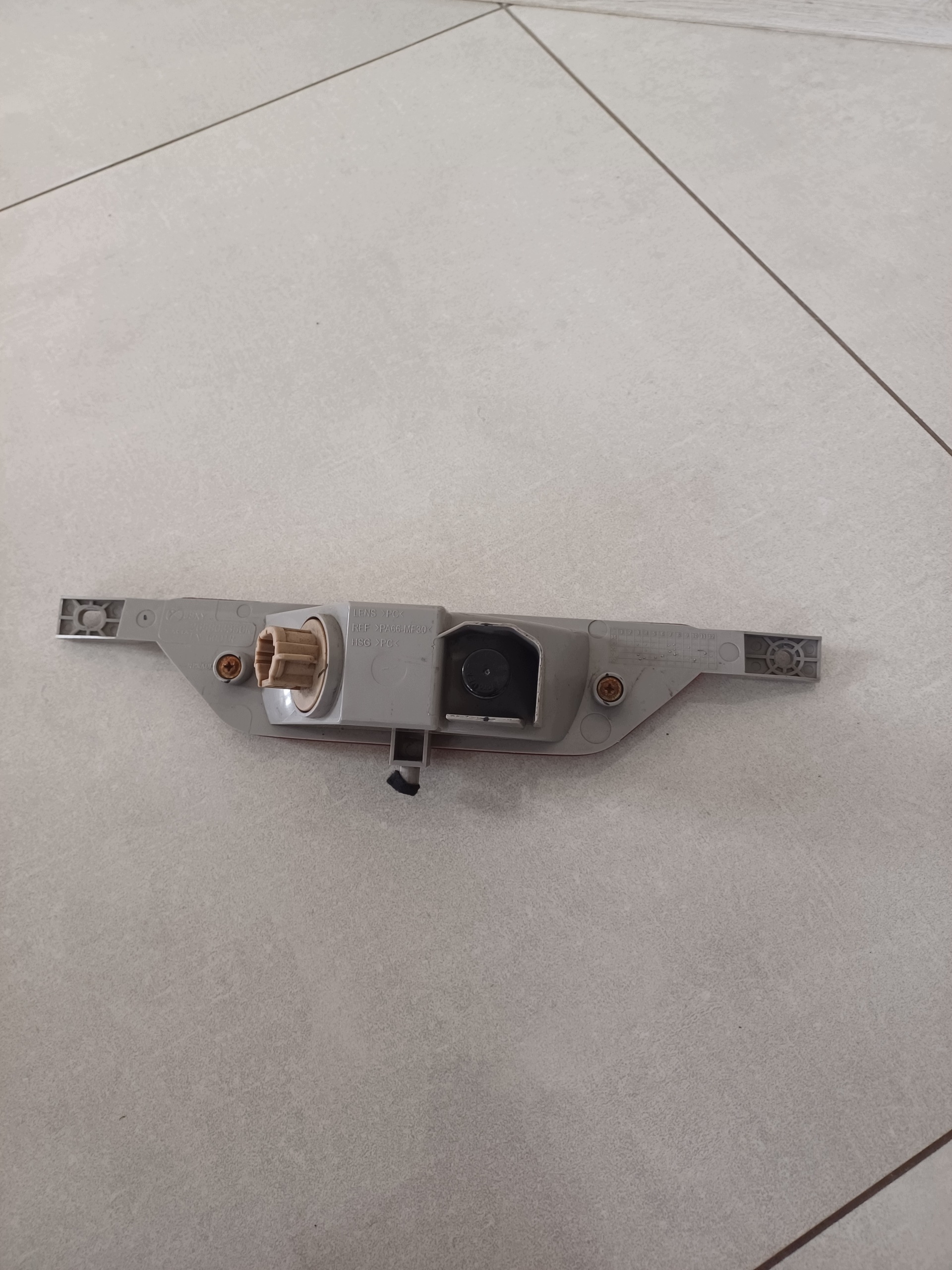 light PRZECIWMGIELNE bonnet rear part DACIA SPRING 265803356R