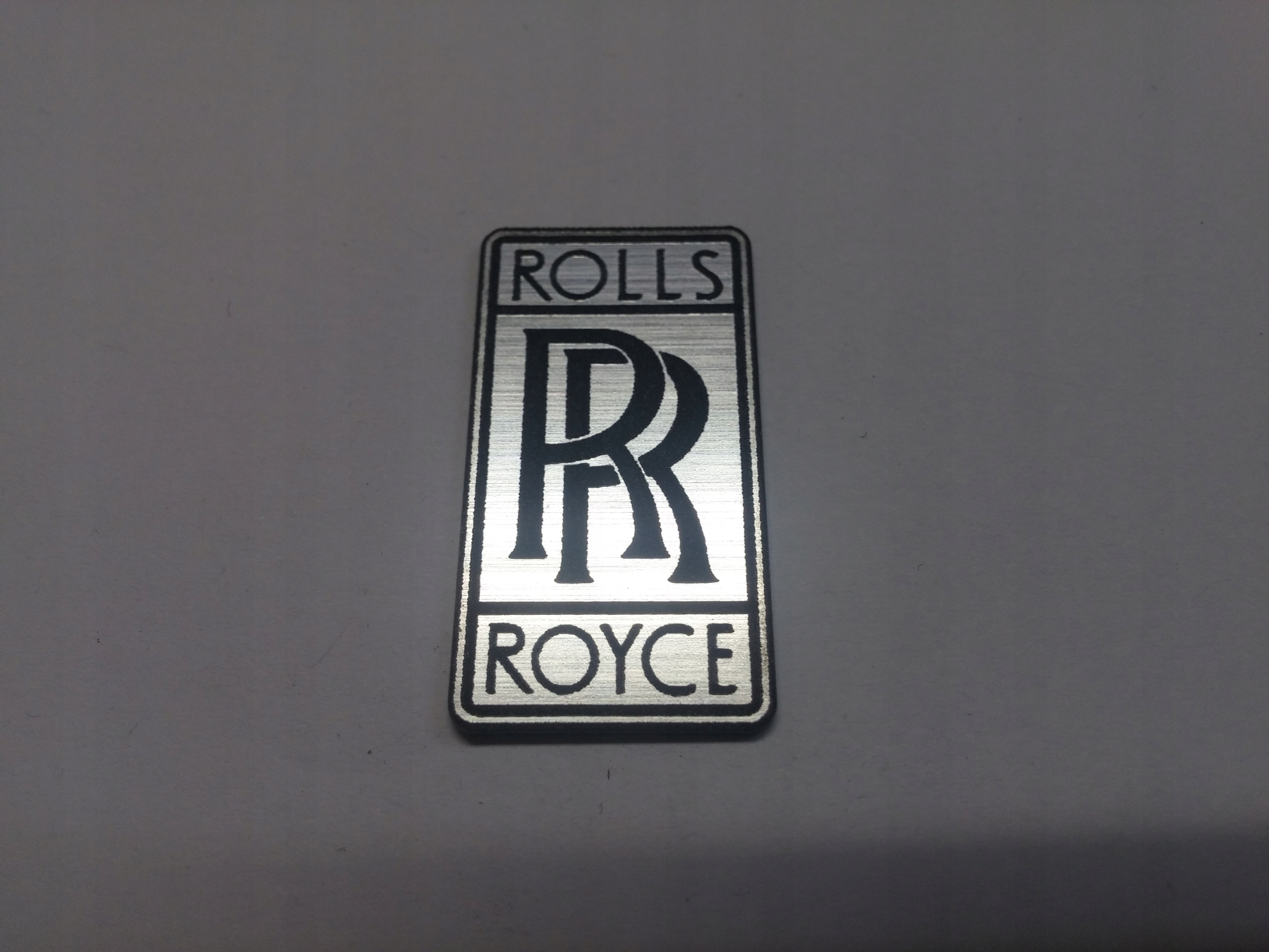

Rolls Royce naklejka emblemat 30 x 15 mm * Srebrna