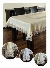 

Obrus z haftem gipiurowym 160 x 350 cm. kremowy .