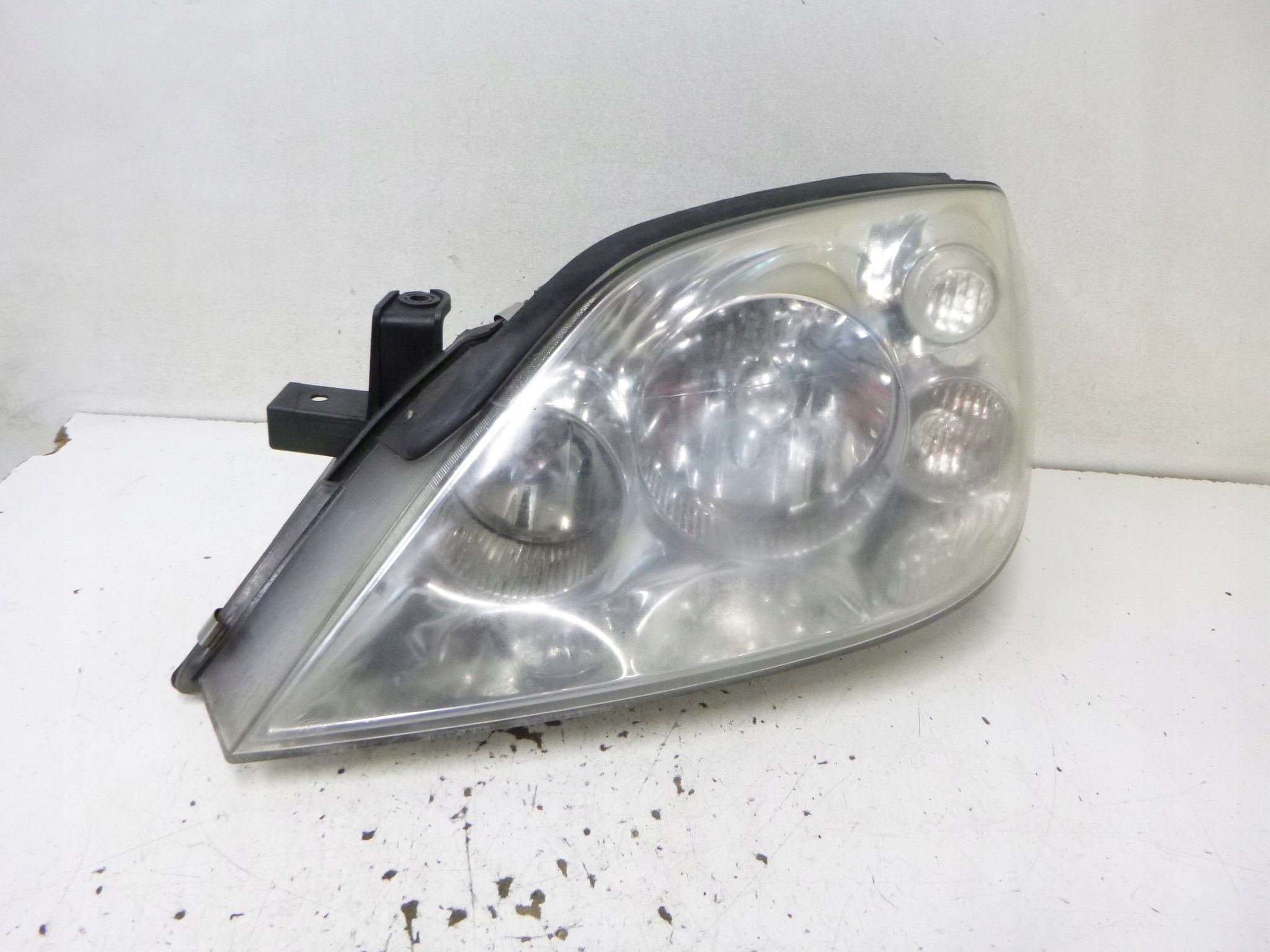 light front Nissan Primera P12 2002r. HELLA 1EJ 238 010-01