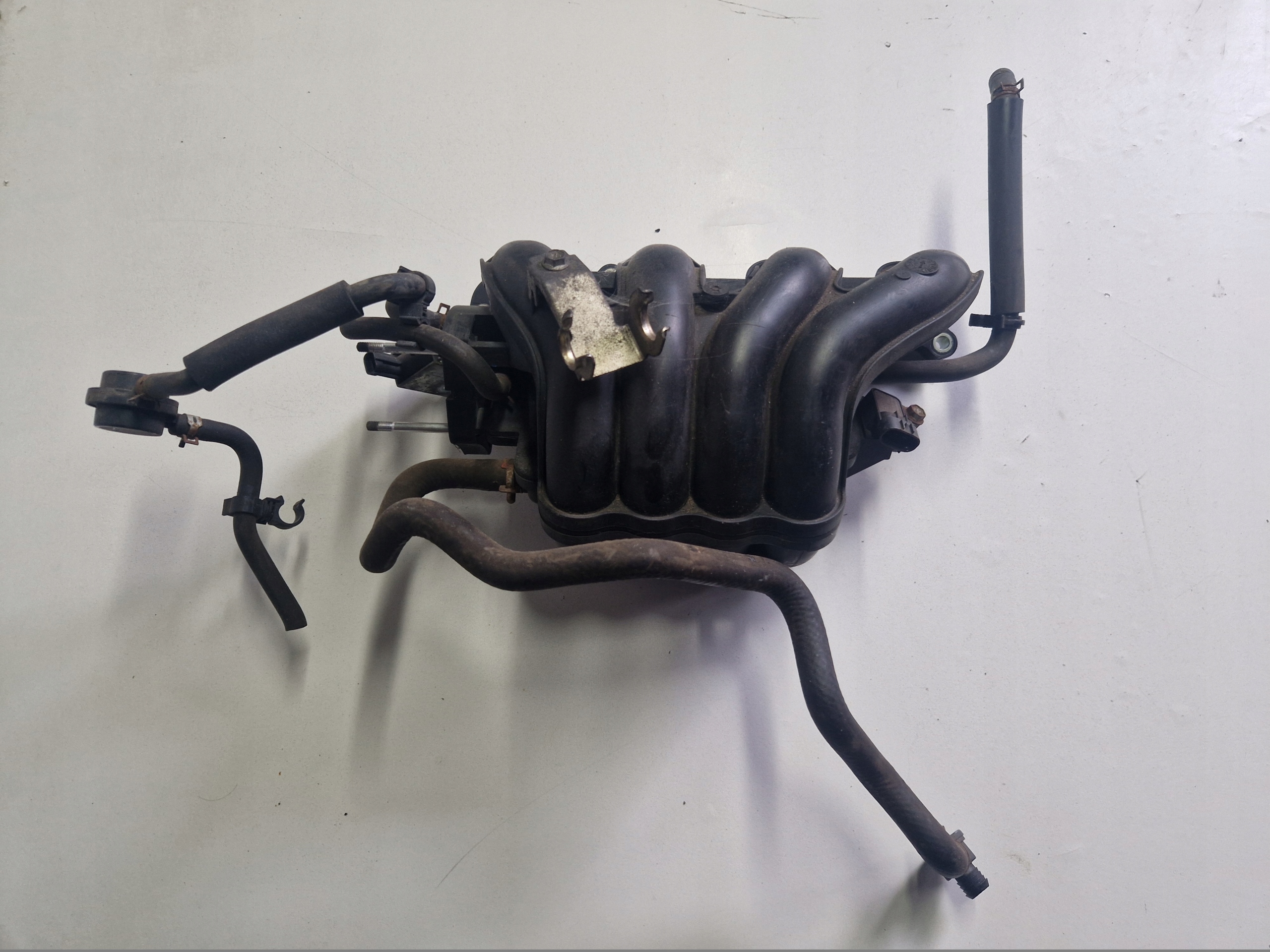 коллектор Впускный 1058811S02 SWIFT IV MK7 1.2b