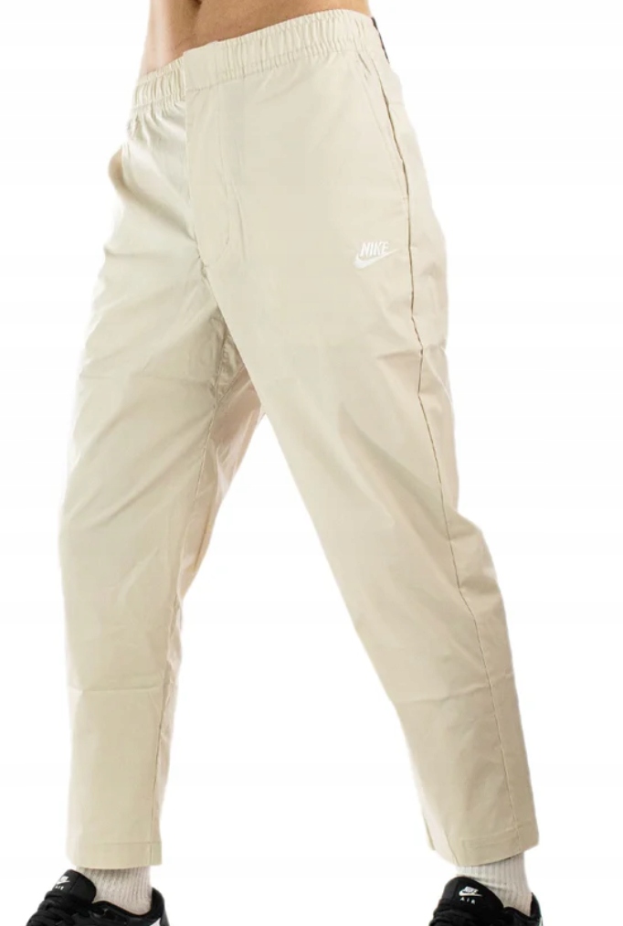 Pánské kalhoty Nike Club Woven Utility Simple Sneaker Lenght DM6823-104 XL