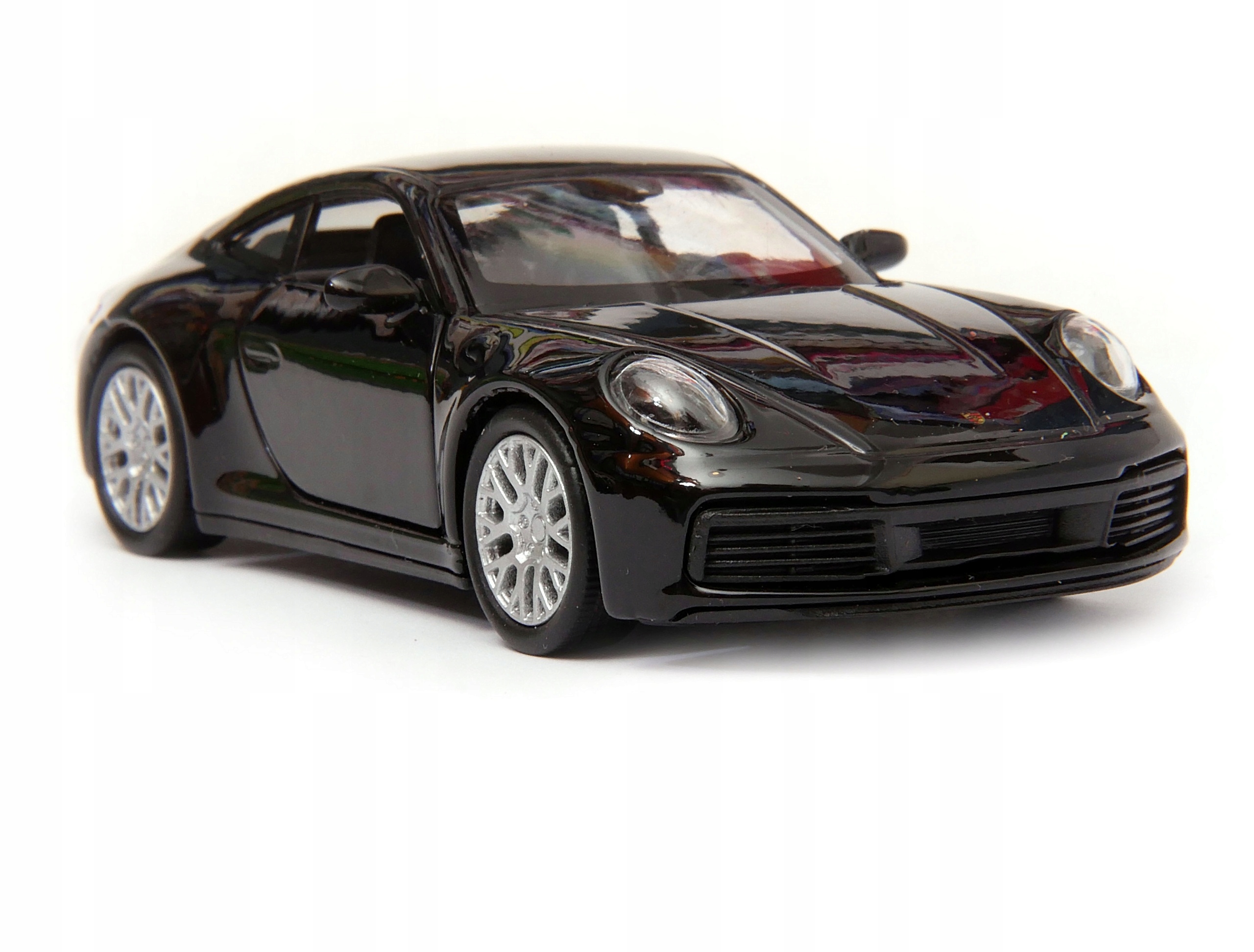Porsche 911 Carrera 4S 1:34 -39 модель Welly