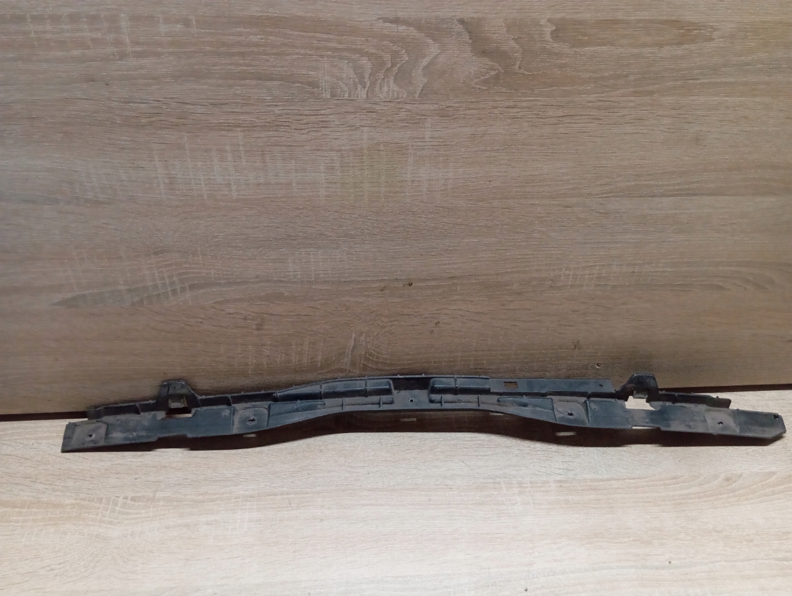 bumper bracket rear part central Opel Astra H Kombi 24460477