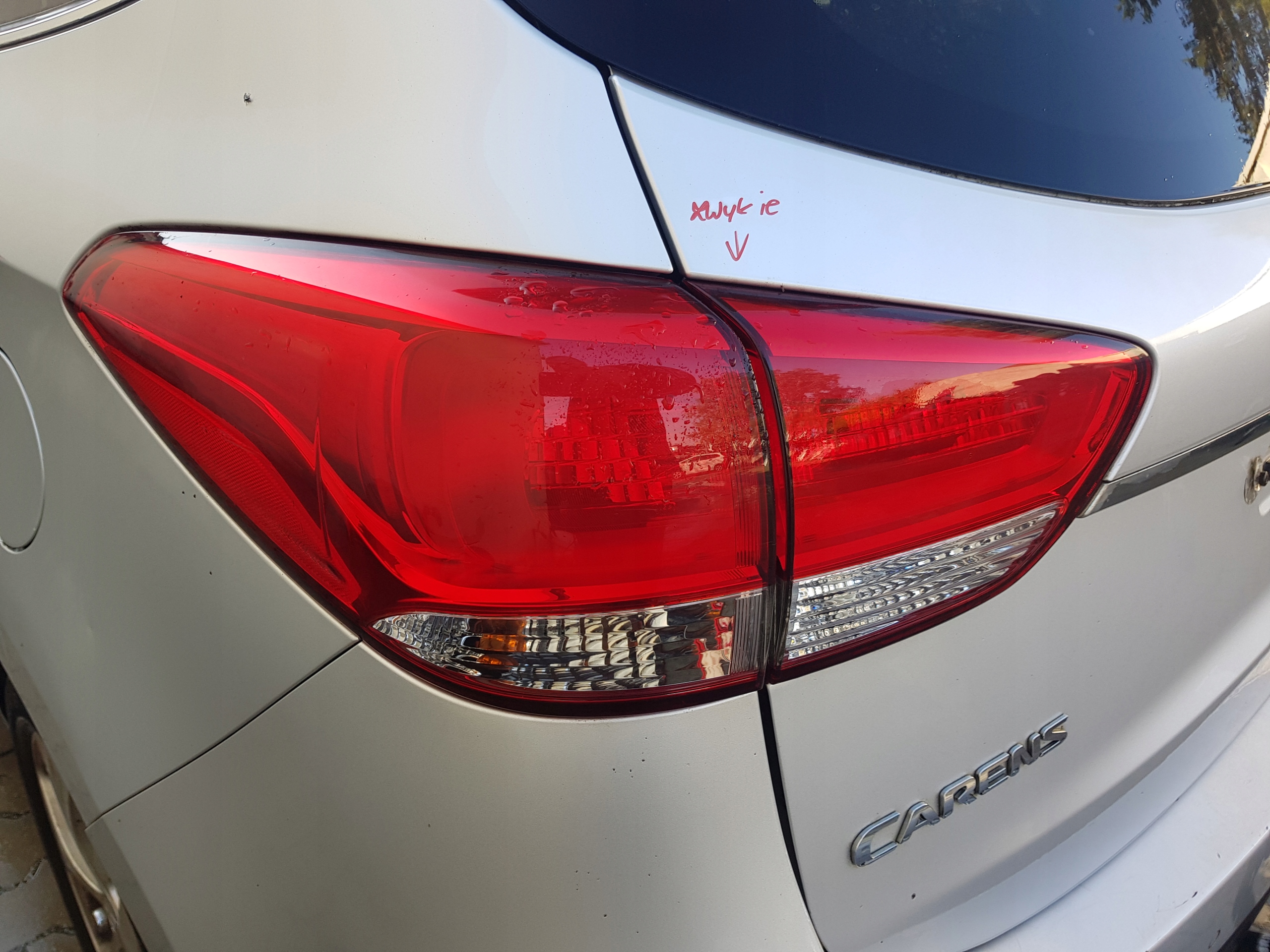 KIA CARENS IV light left rear part W fender 2013