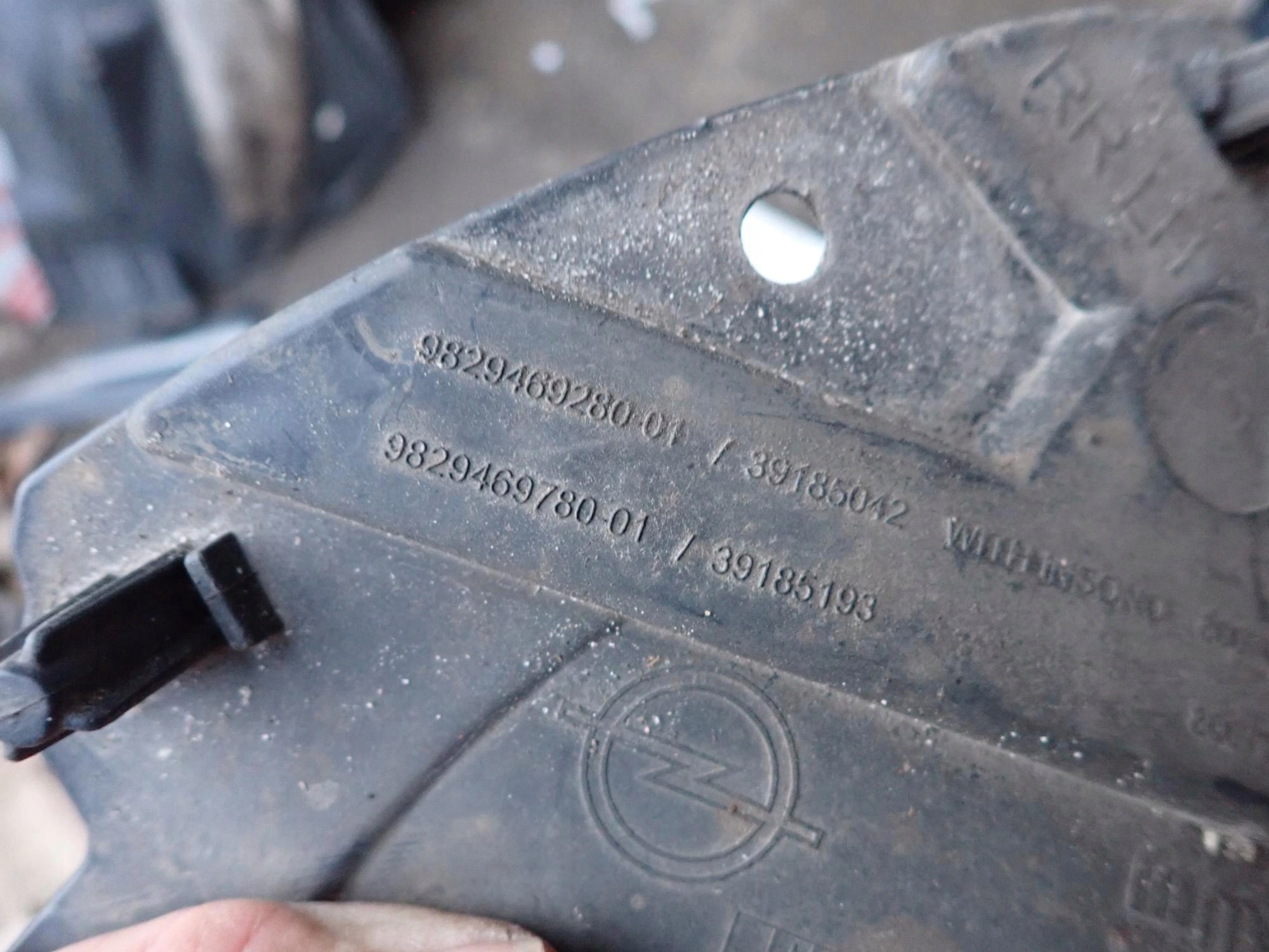 OPEL CORSA F 19-> mudguard rear part rear. left