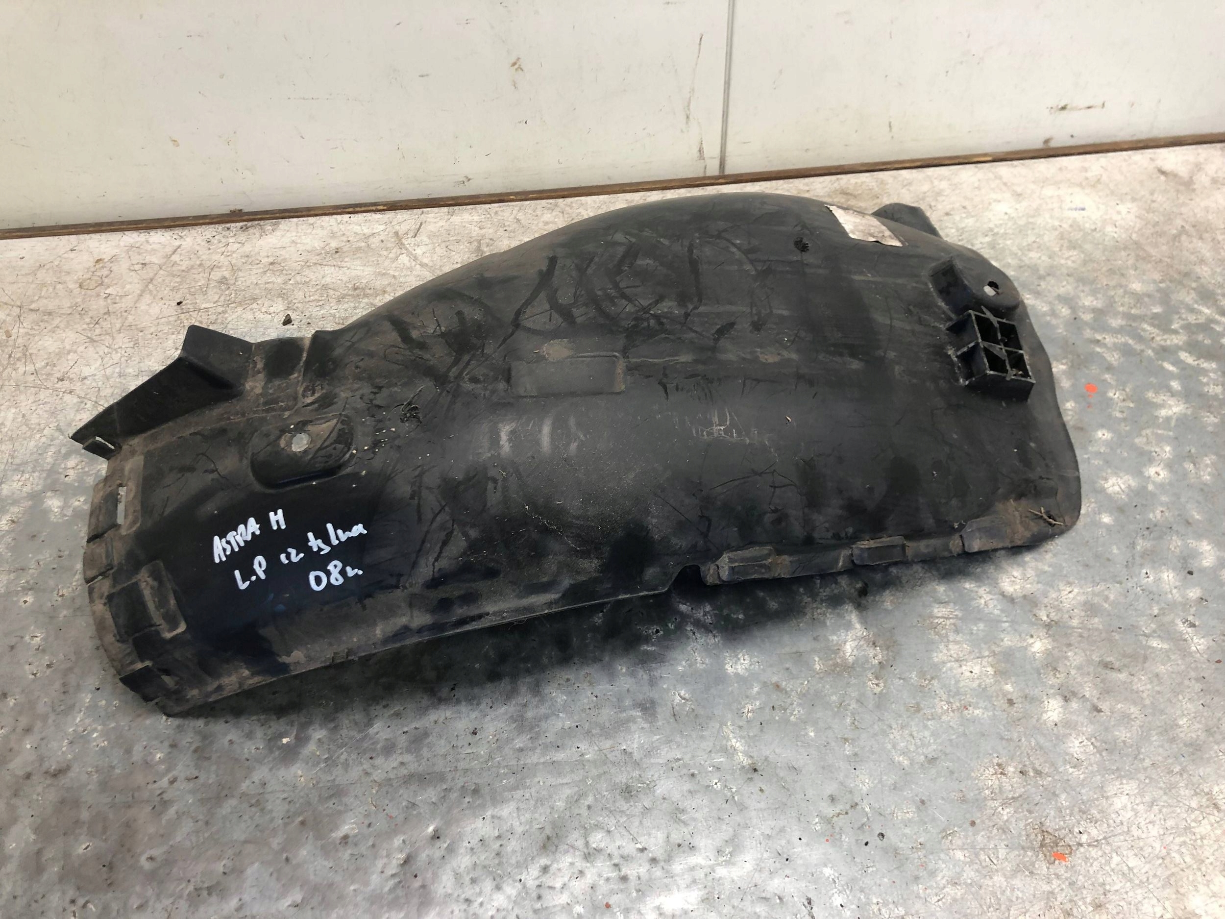 mudguard left front part rear OPEL ASTRA H 13125604