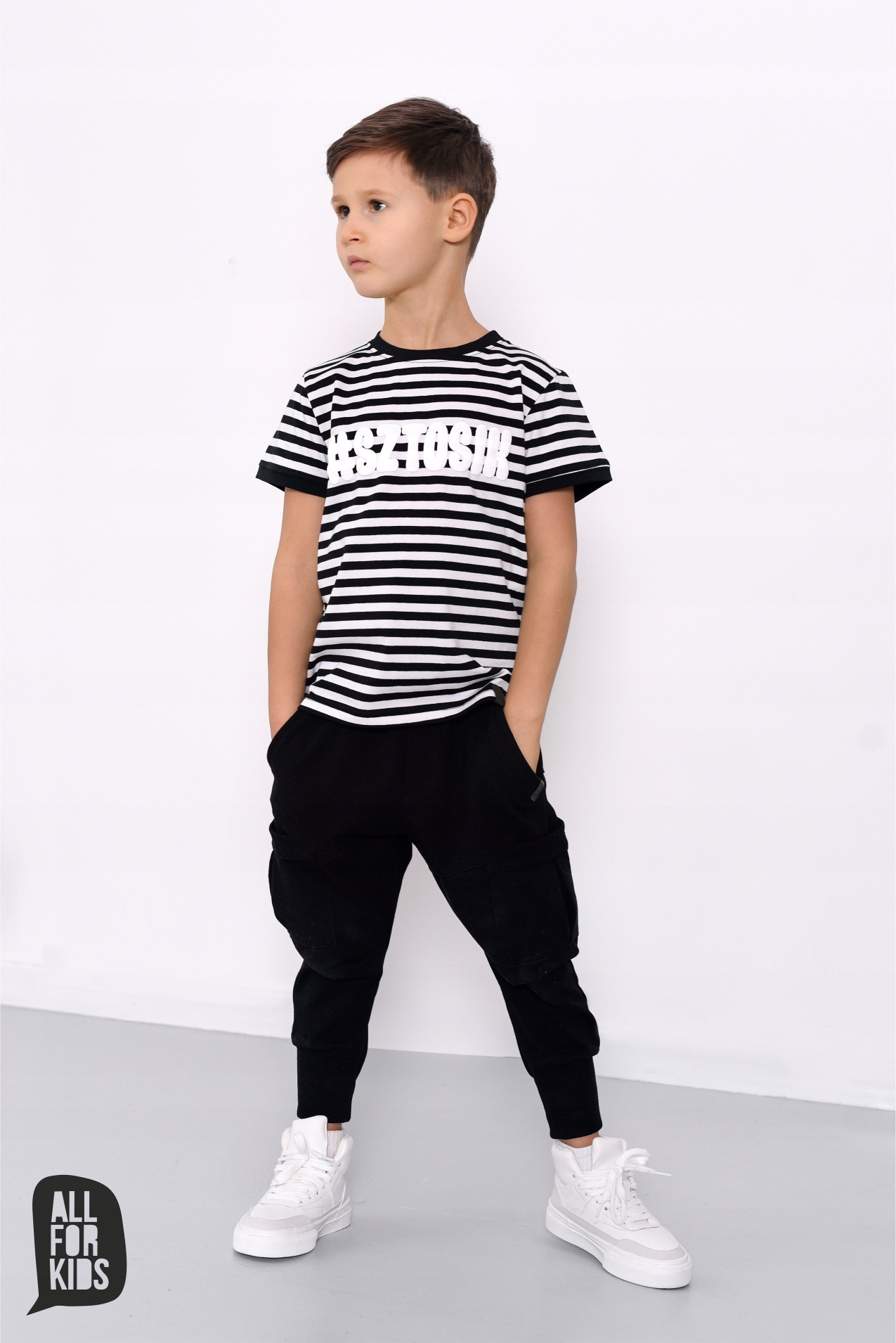 Spodnie z kieszeniami czarne All For Kids 104 110 Wiek dziecka 4 lata +