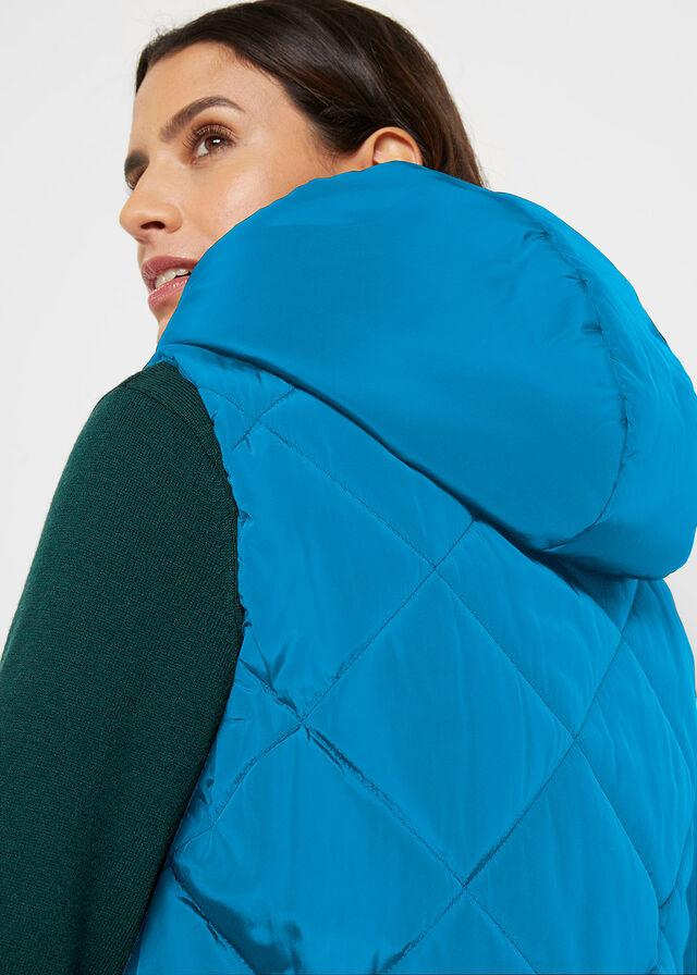 ASYMETRYCZNA KAMIZELKA PIKOWANA__52 Materiał dominujący poliester