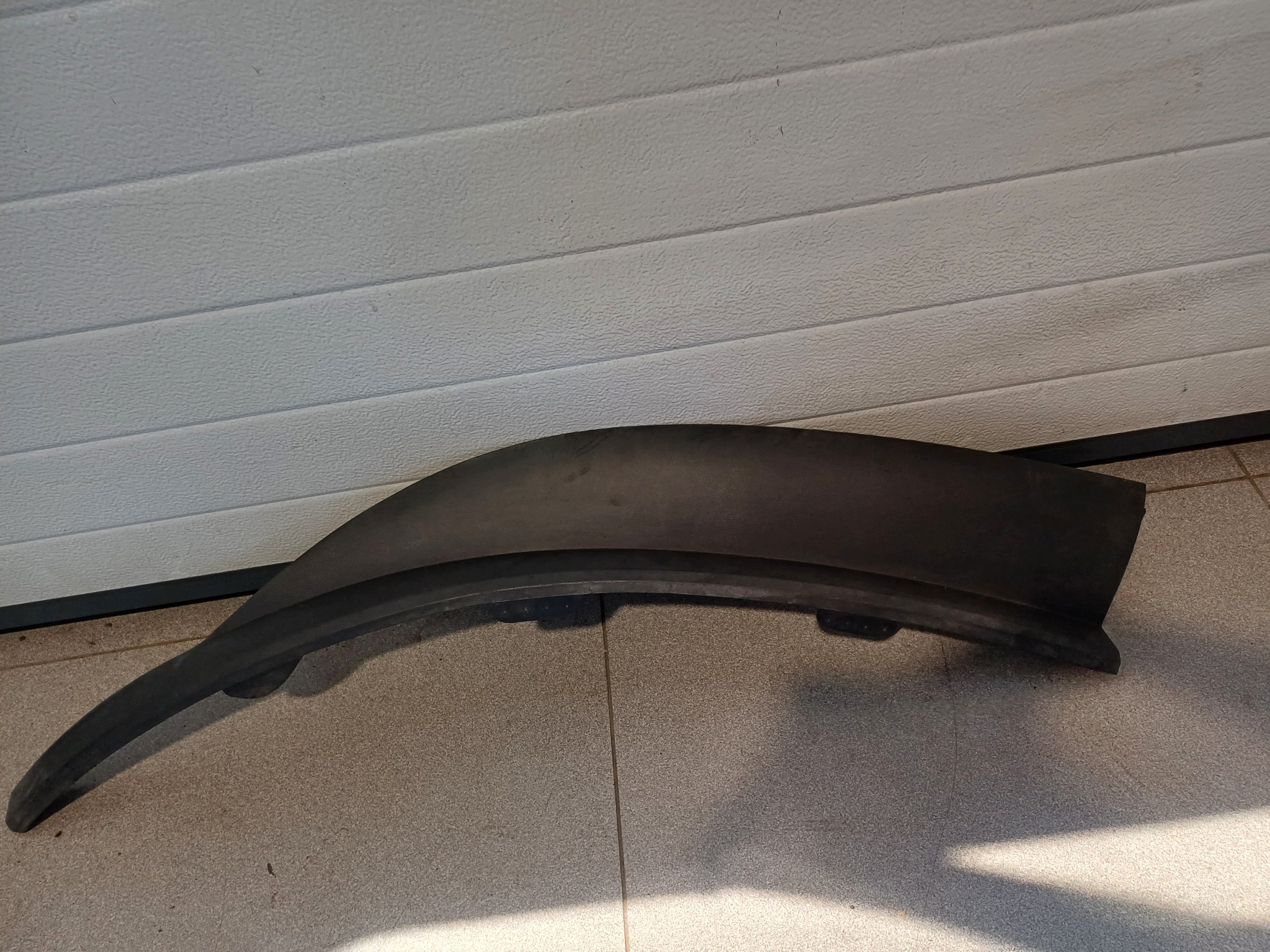 SPOILER of a bumper right front front OPEL ASTRA 4 IV 13264407