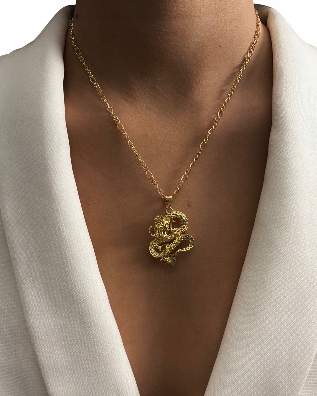 

Złoty wisiorek Naszyjnik łańcuszek Smok stal