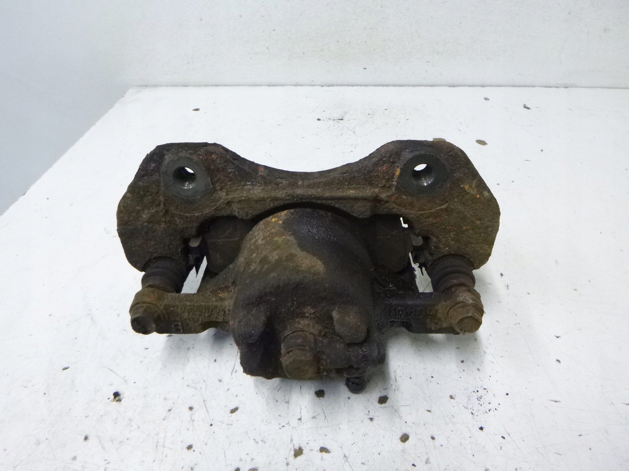 caliper brake front Mitsubishi Lancer VII 1.6