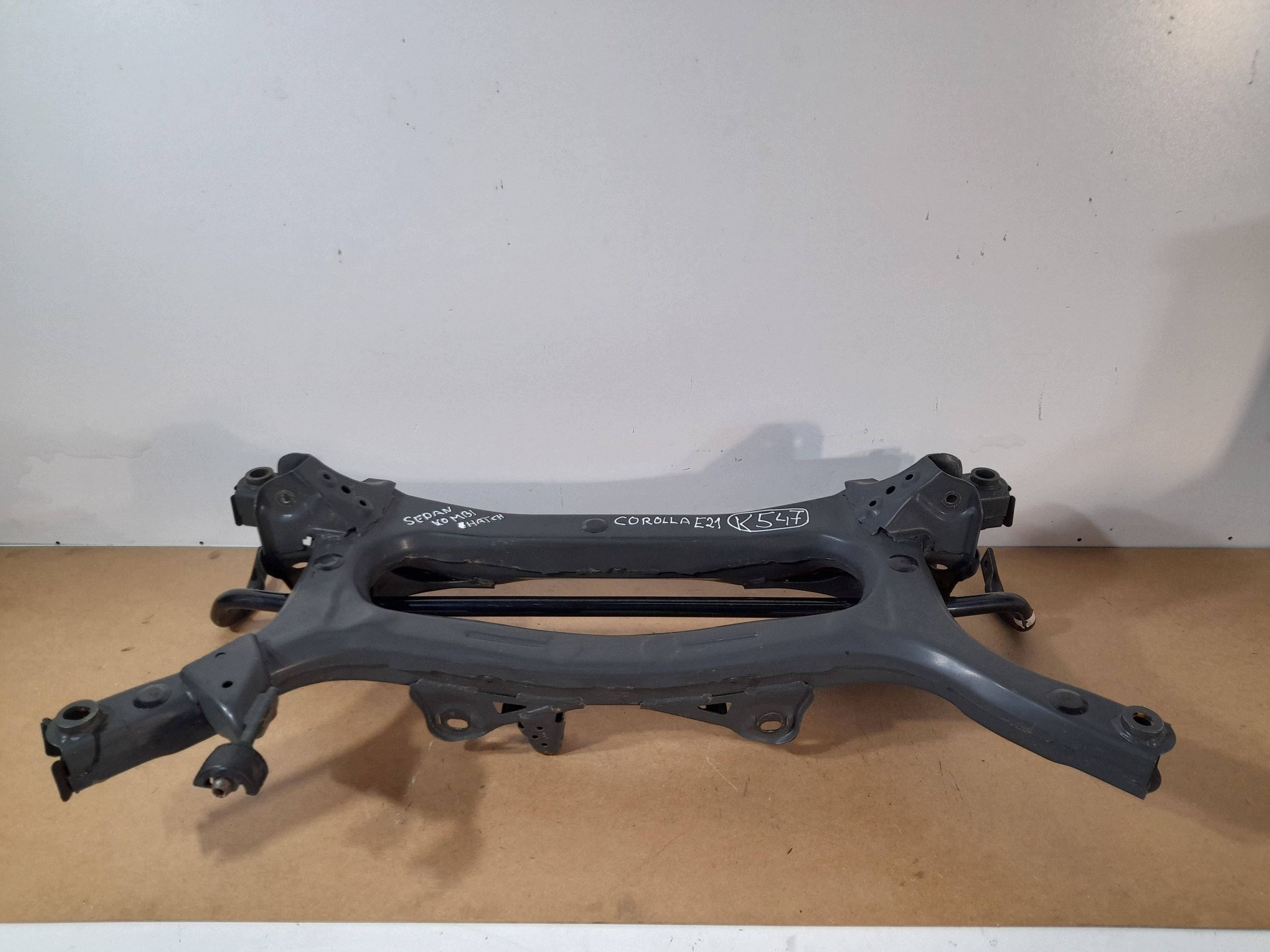 Toyota Corolla E21 axle beam rear. (K547)