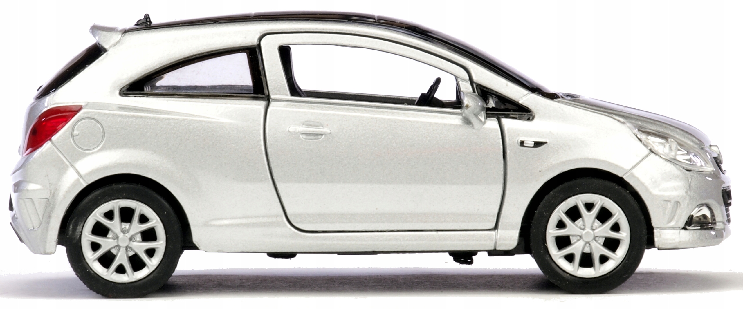 WELLY METALOWE AUTO OPEL CORSA OPC OTWIERANE DRZWI MODEL AUTA Wiek dziecka 3 lata +
