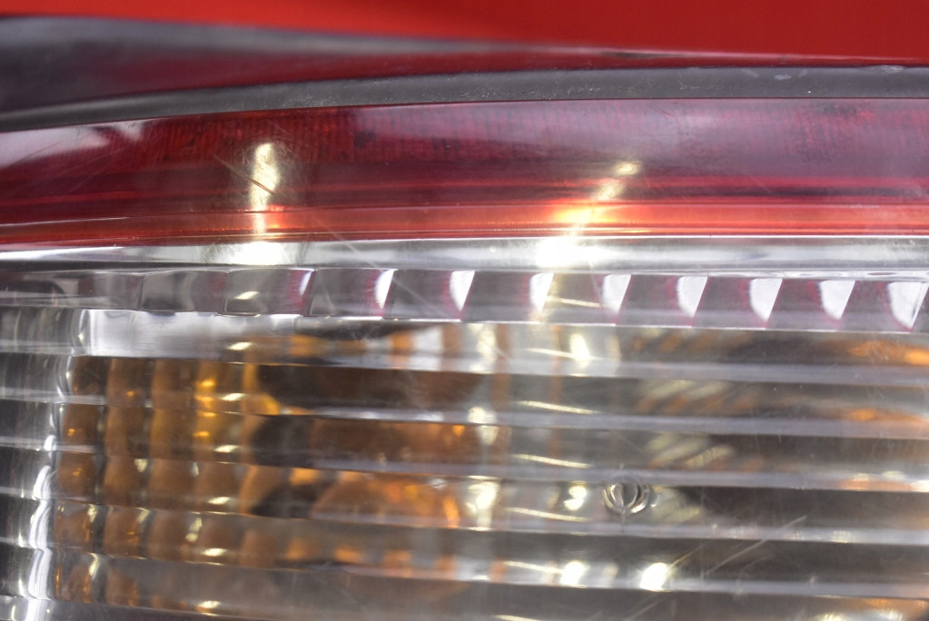 фонарь левый kia CARENS 2 II 02-06