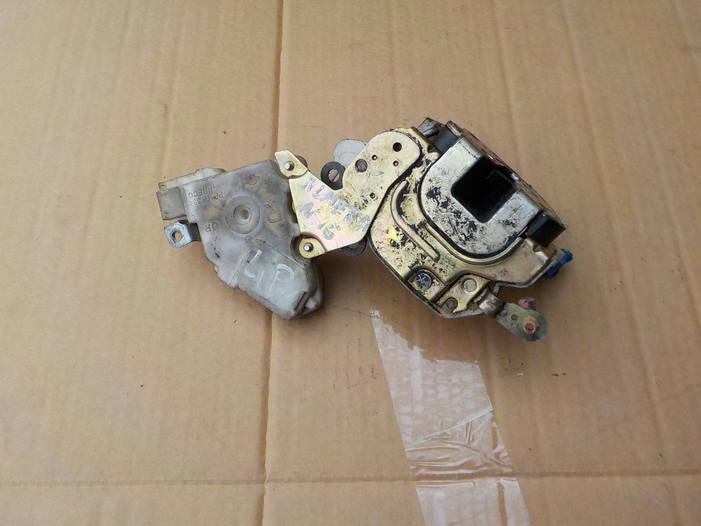 lock left front nissan almera n16 2004r