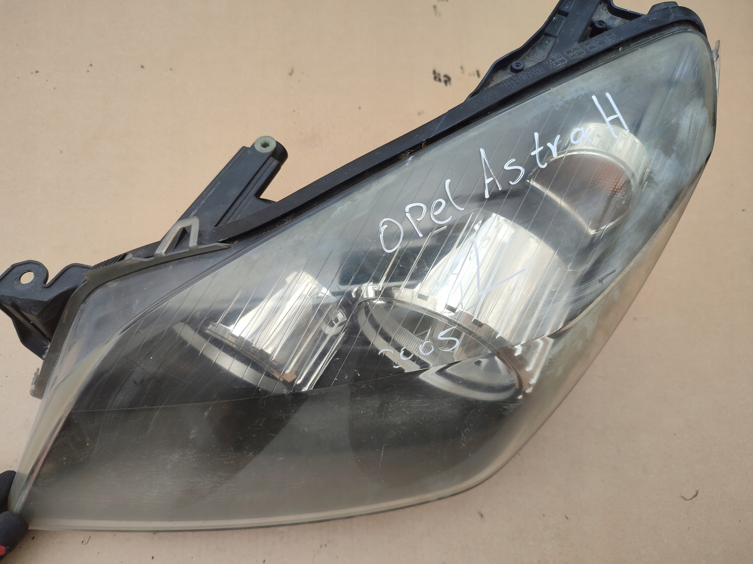 REFLEKTOR left light front front left OPEL ASTRA H EUROPA 24451032
