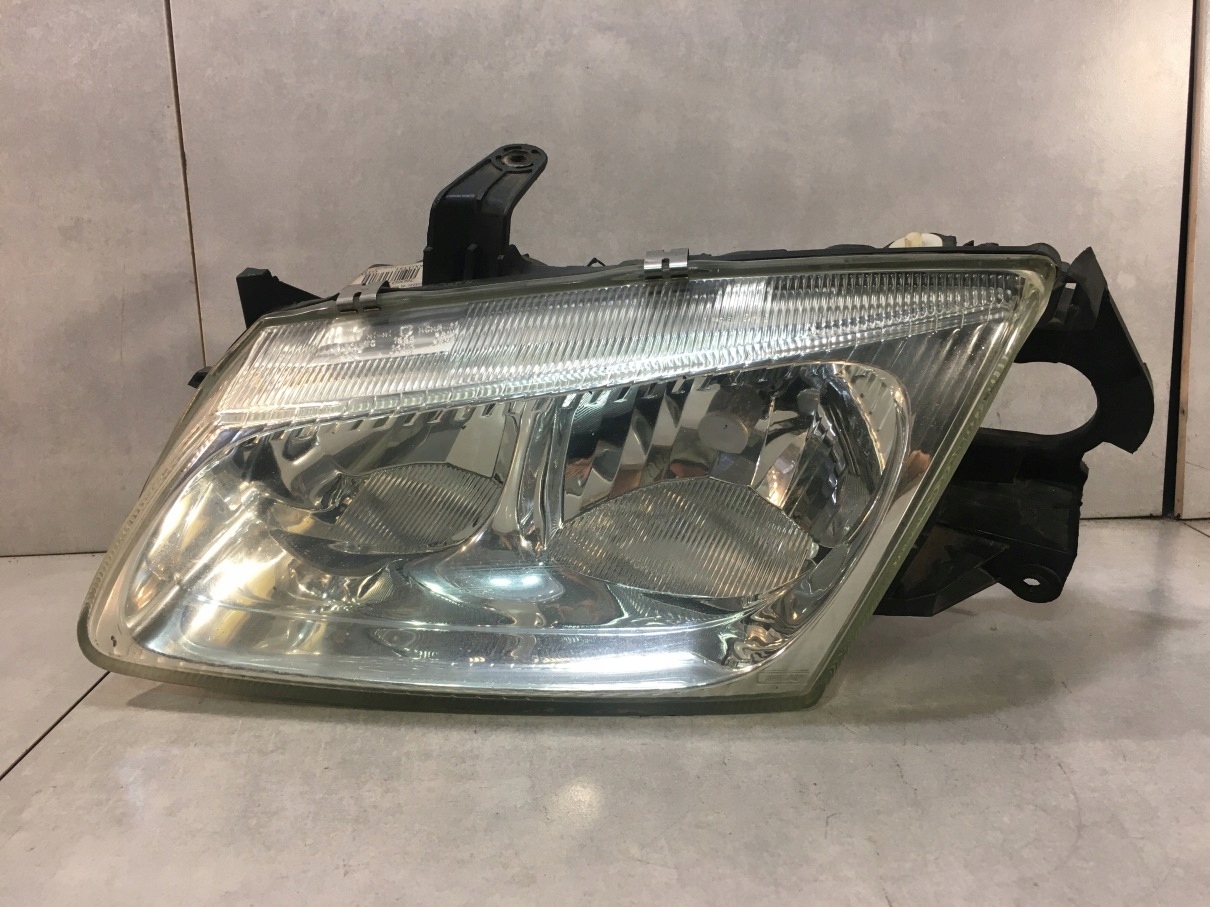 фара левая ALMERA N16 26060BN011 04HCR