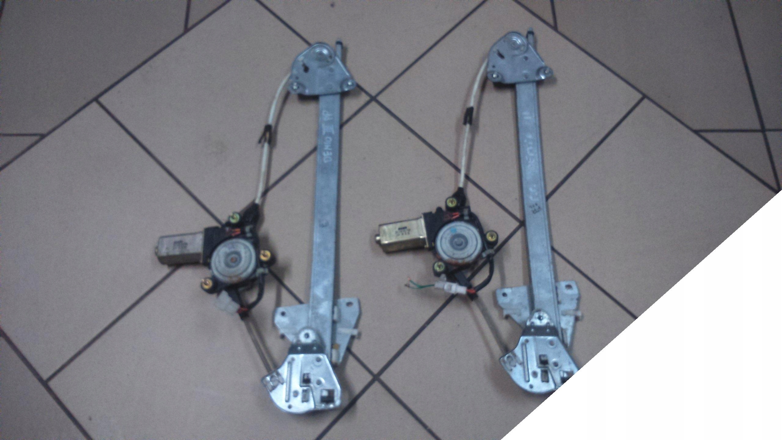 DEMIO 98-03 MECHANIZM SZYBY ELE. PRAWY PRZÓD PP