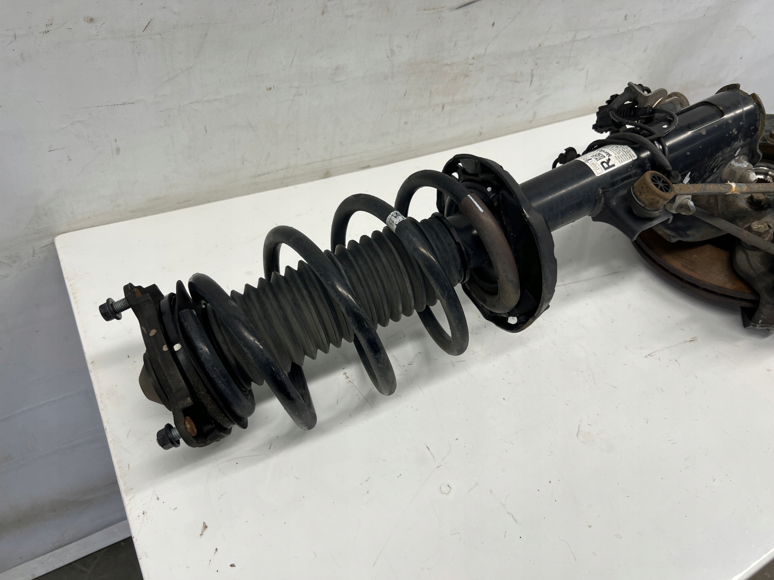 Tucson III 1.7 CRDi McPherson right front swing right 54660-D7000