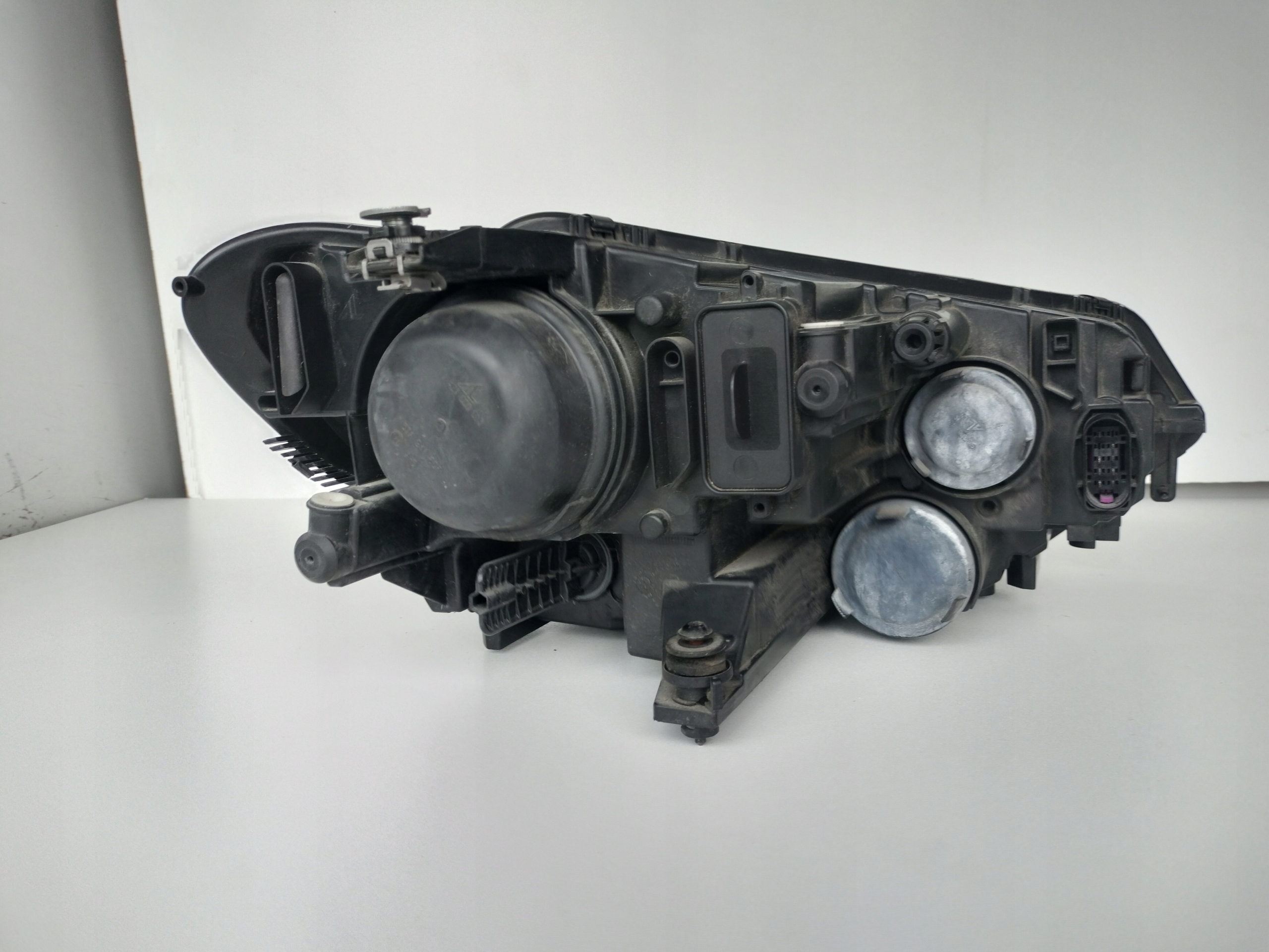 light left REFLEKTOR VW TOURAN 5TA 16