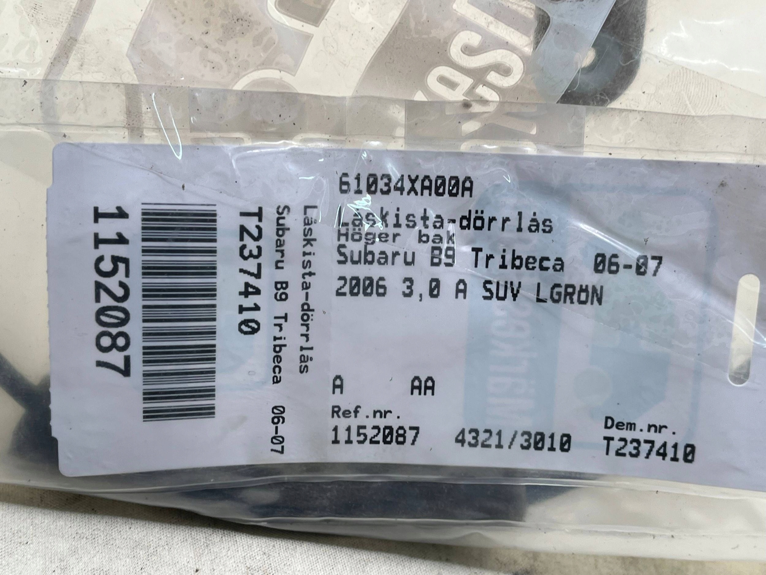 61034XA00A lock door tylnych prawych SUBARU TRIBECA !J