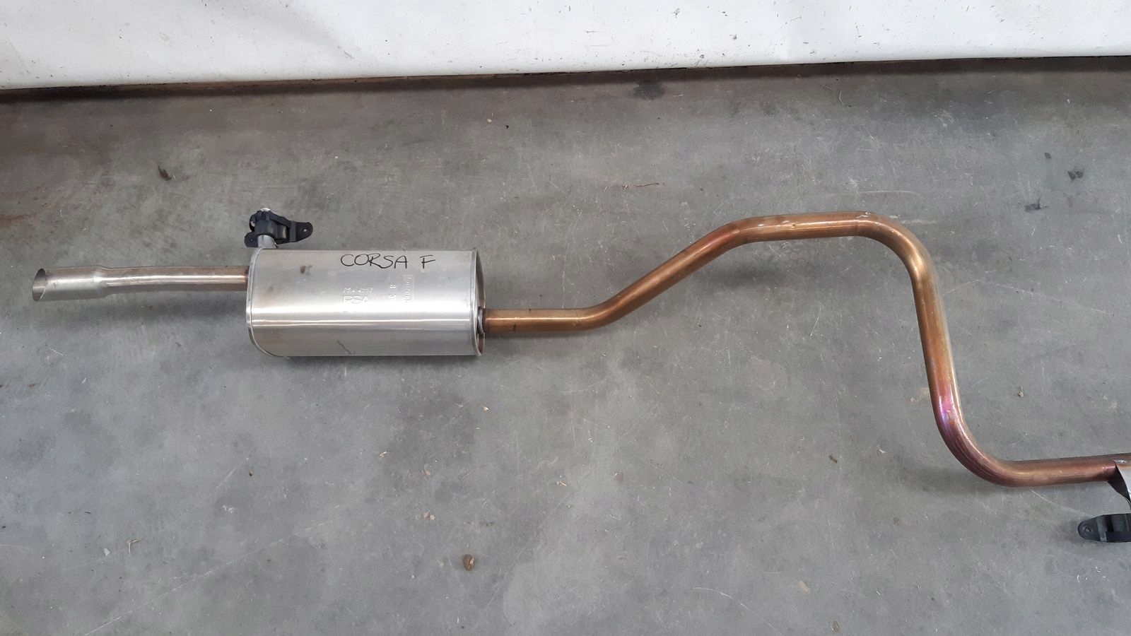 Tlumik koncowy mitte Opel Corsa F 1,2