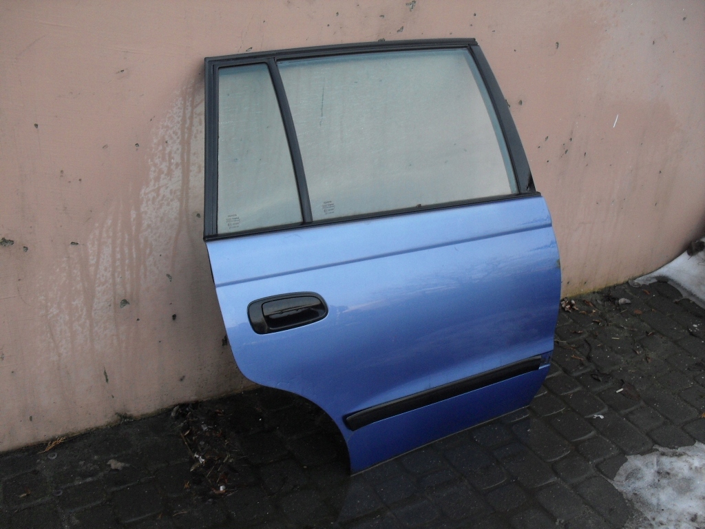 DRZWI LEWE PRAWE TYŁ TOYOTA CARINA E KOMBI 1996r Strona zabudowy tył - lewa