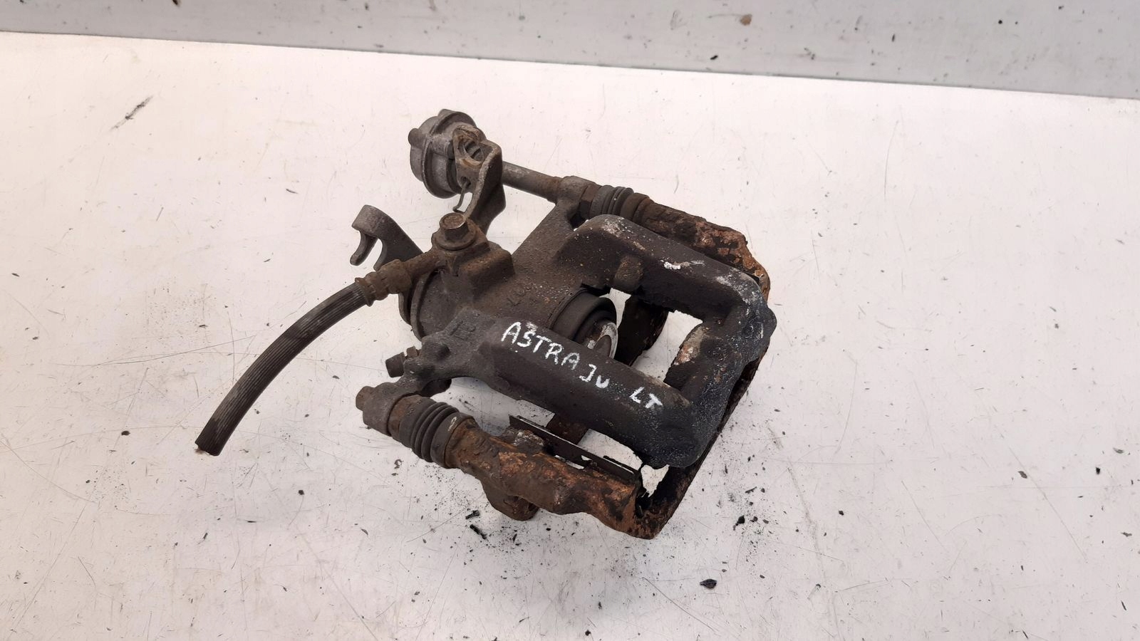 caliper rear part rear left Opel Astra J 2,0 CDTI