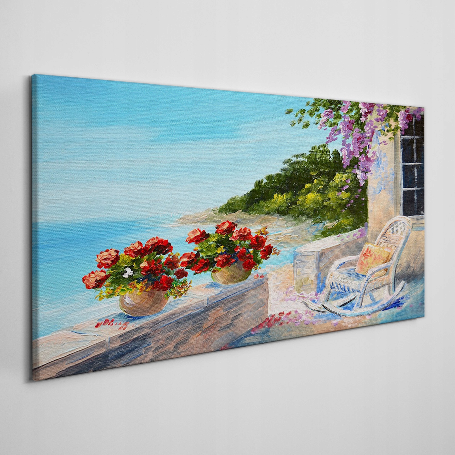 

Obraz płótno Wybrzeże kwiaty morze niebo 100x50 cm