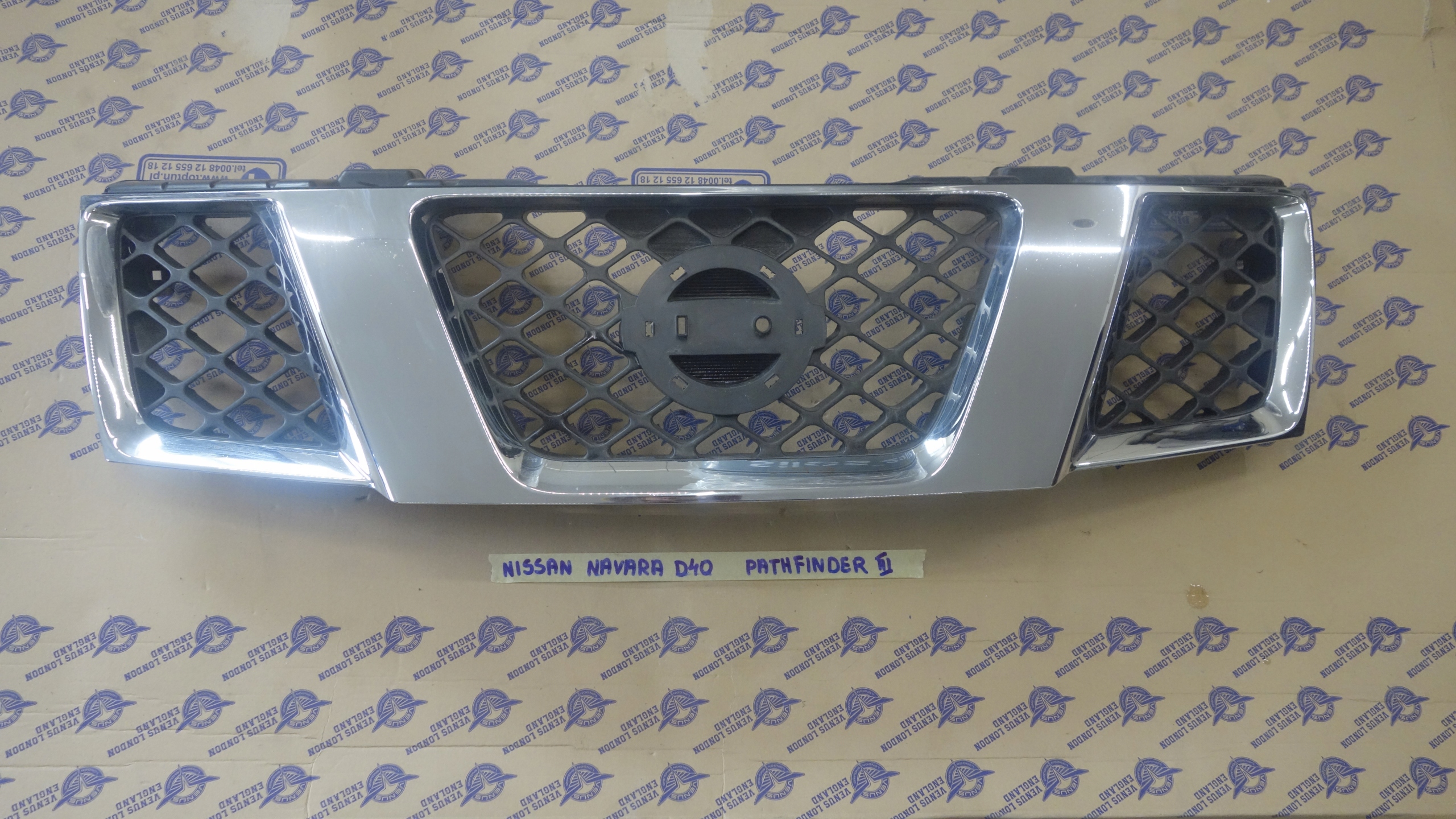 810EB400 - Решетка радиатора NISSAN NAVARA D40 III Pathfinder