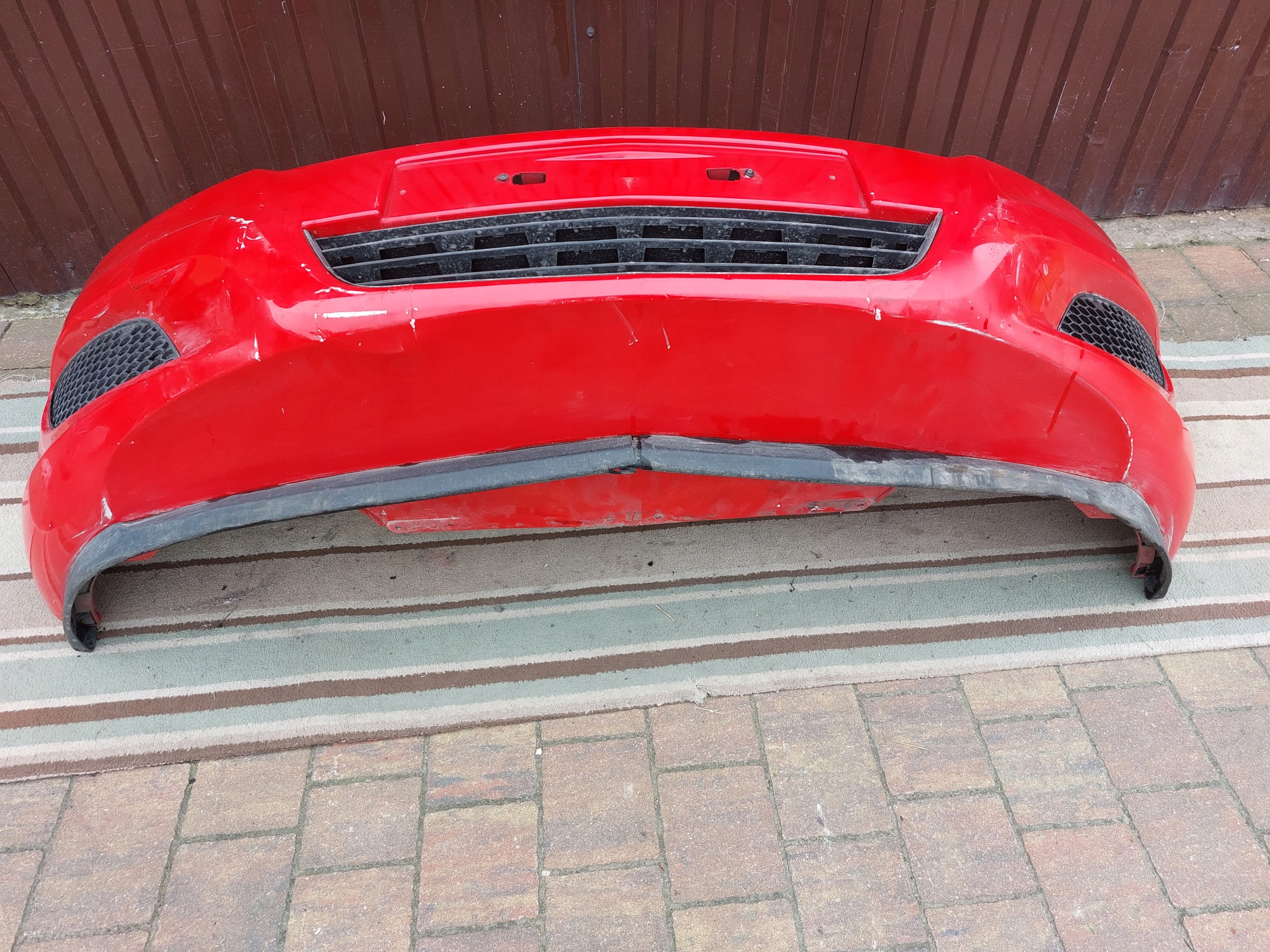 bumper front OPEL ZAFIRA B LIFT red 13r
