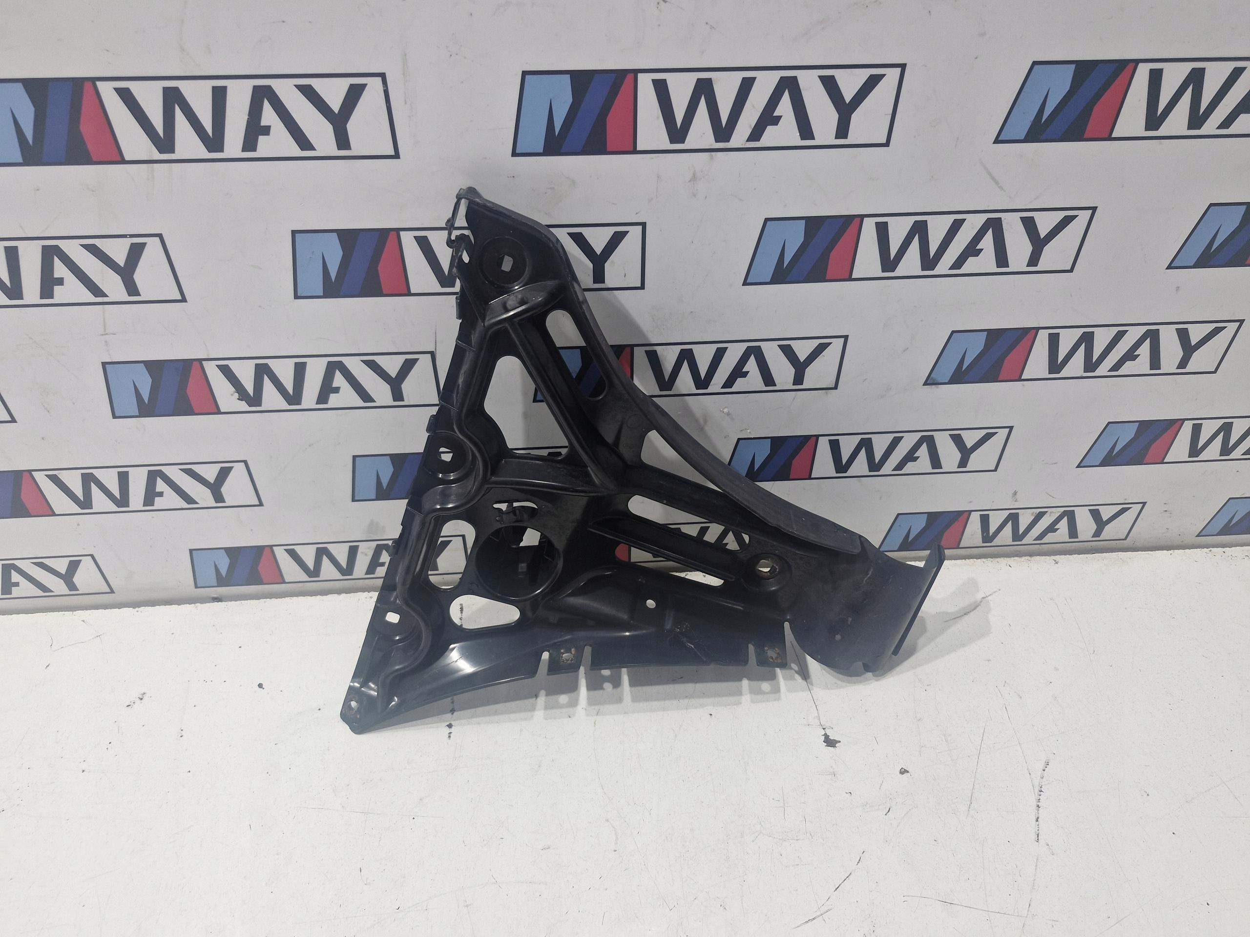 7060795 BMW E61 support holder of a bumper left rear part