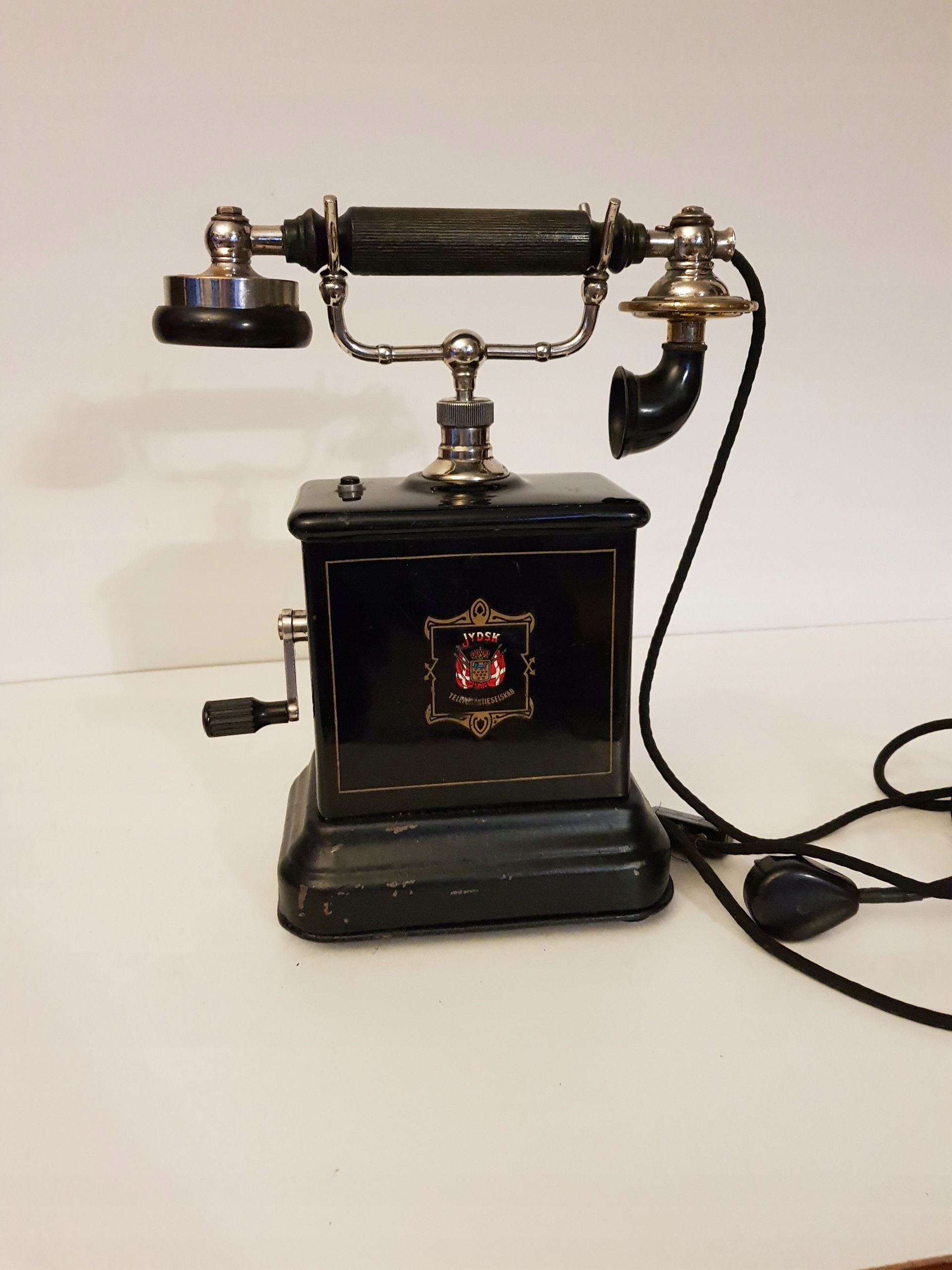 Телефон на ручку зажима Aktieselskab