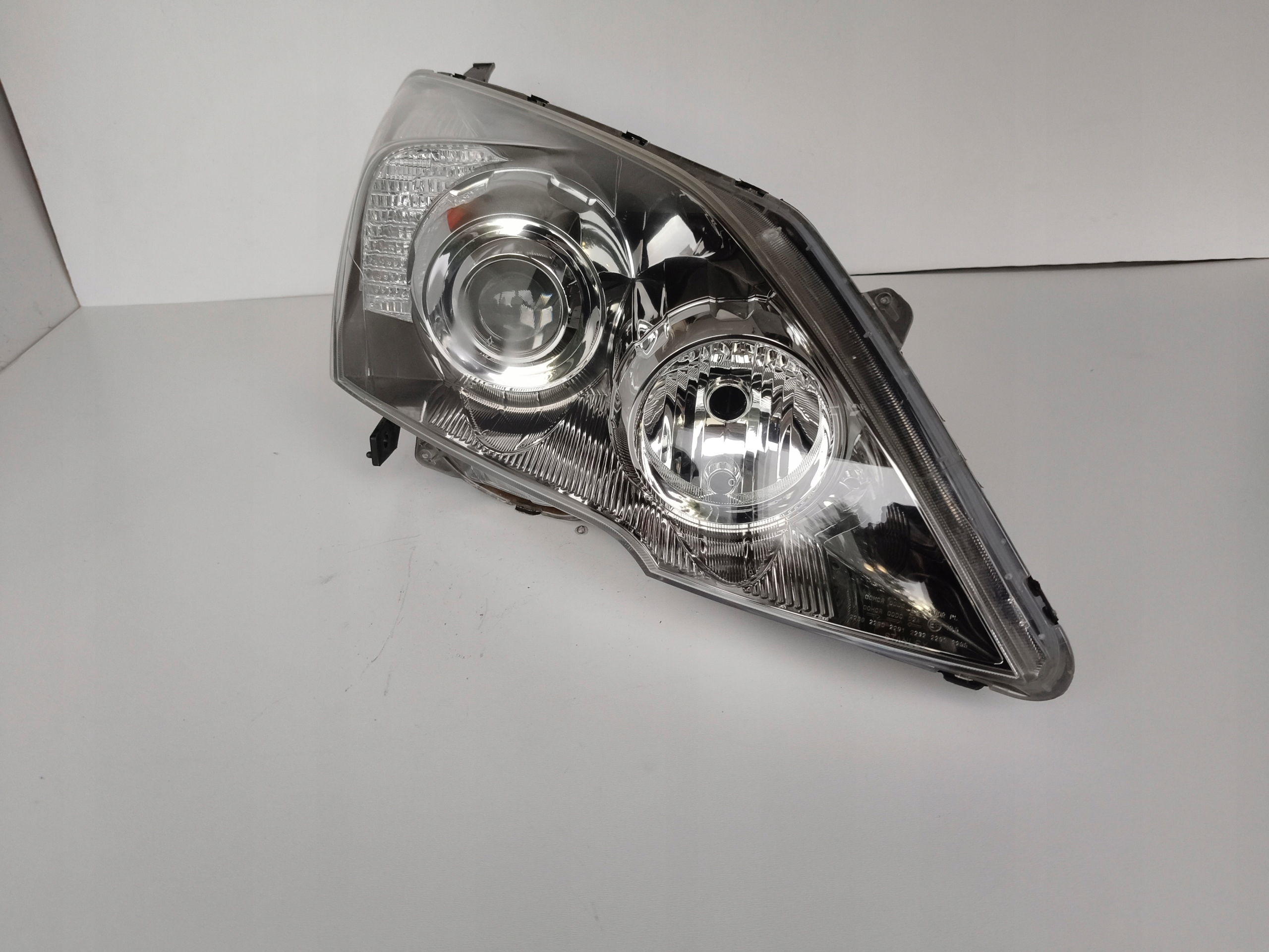 light right REFLEKTOR HONDA CRV III 06