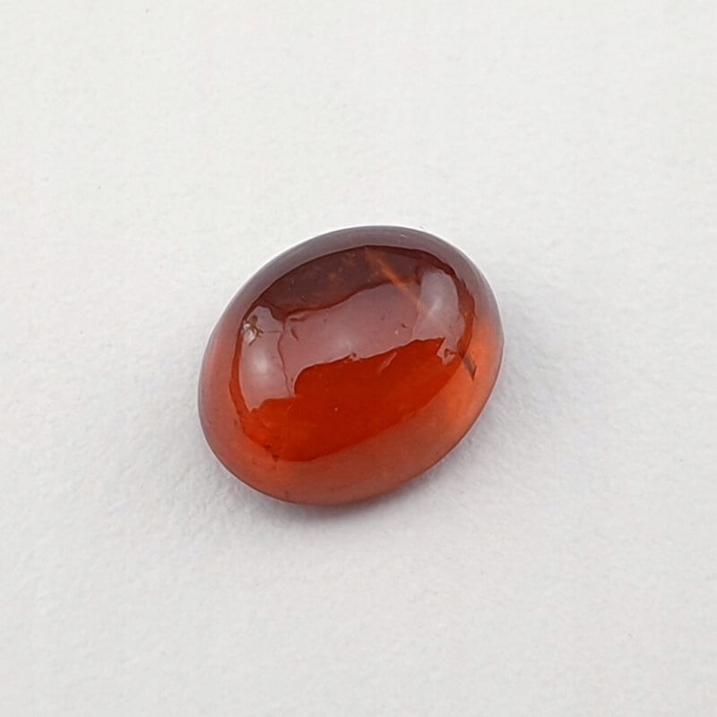 Granat Hessonit kaboszon ~8x6 mm nr 23