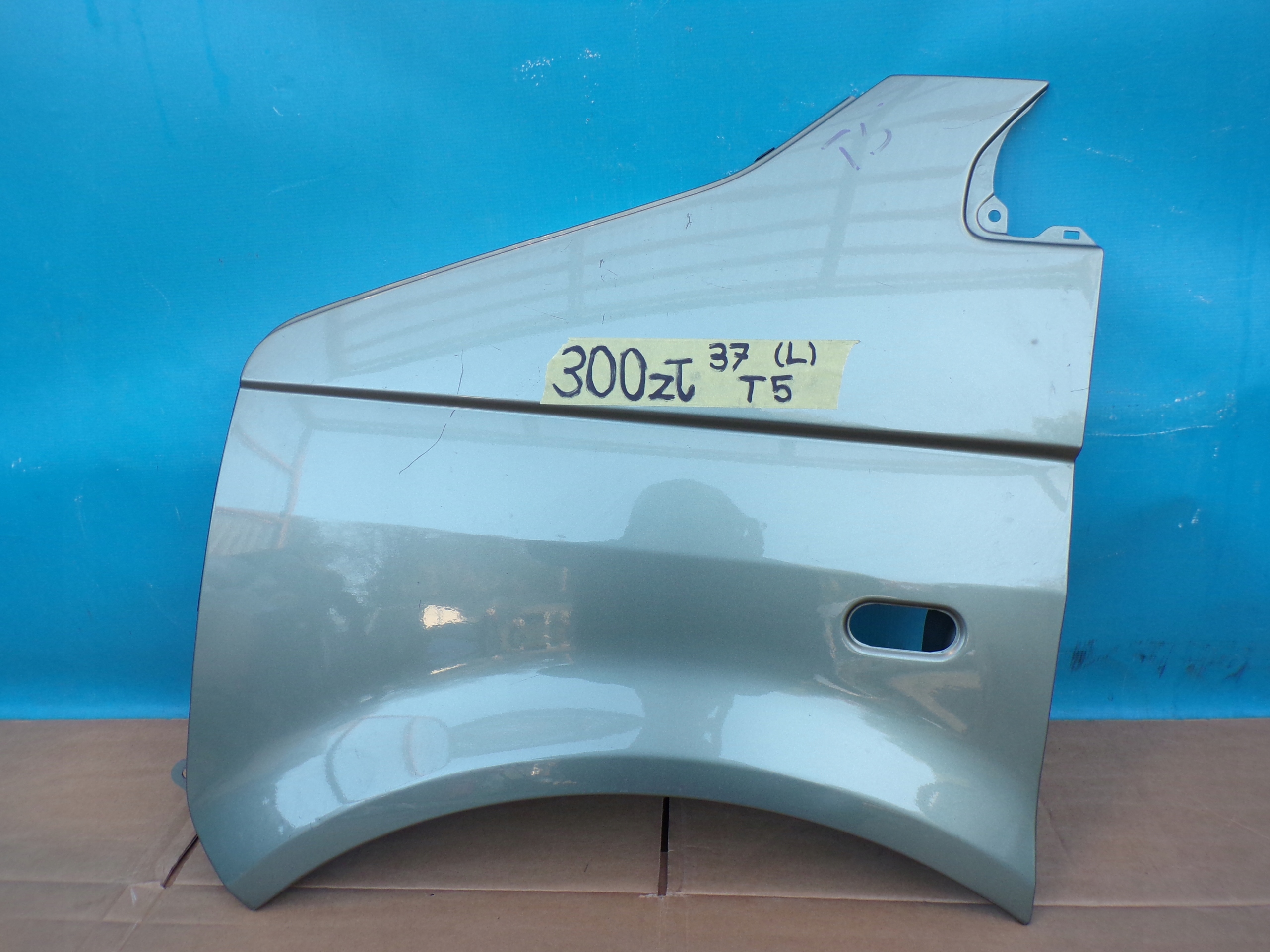 VW T5 TRANSPORTER MULTIVAN 03- fender left oliwkowy without RDZY