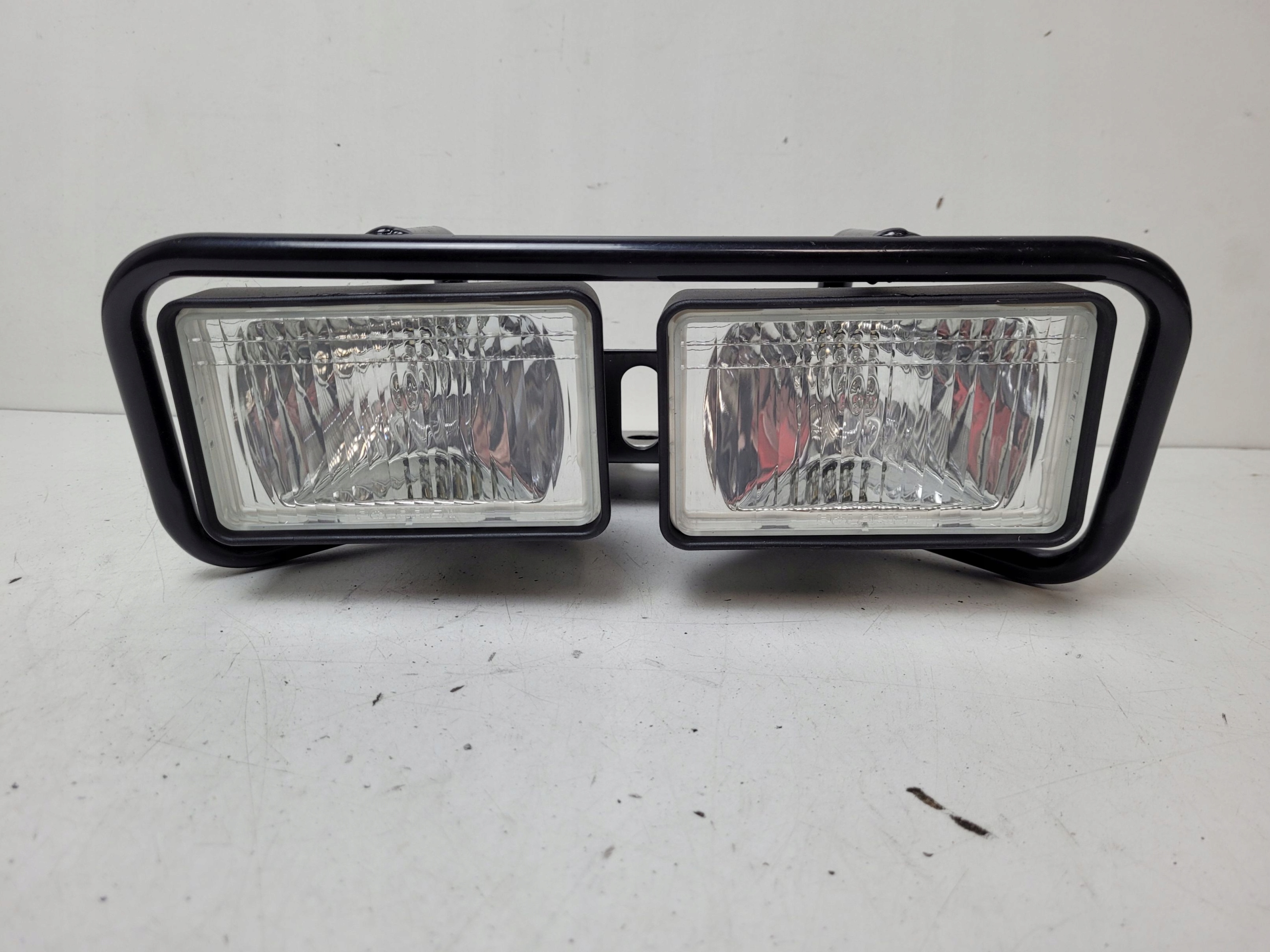POLARIS SCRAMBLER 400 500 REFLEKTOR LAMPA PRZÓD PODWÓJNA STELAŻ