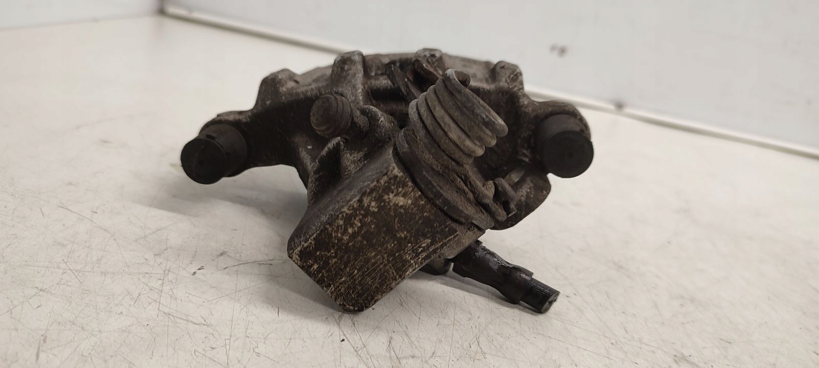 caliper rear part rear left Ford Focus MK3 1,6 TDCI